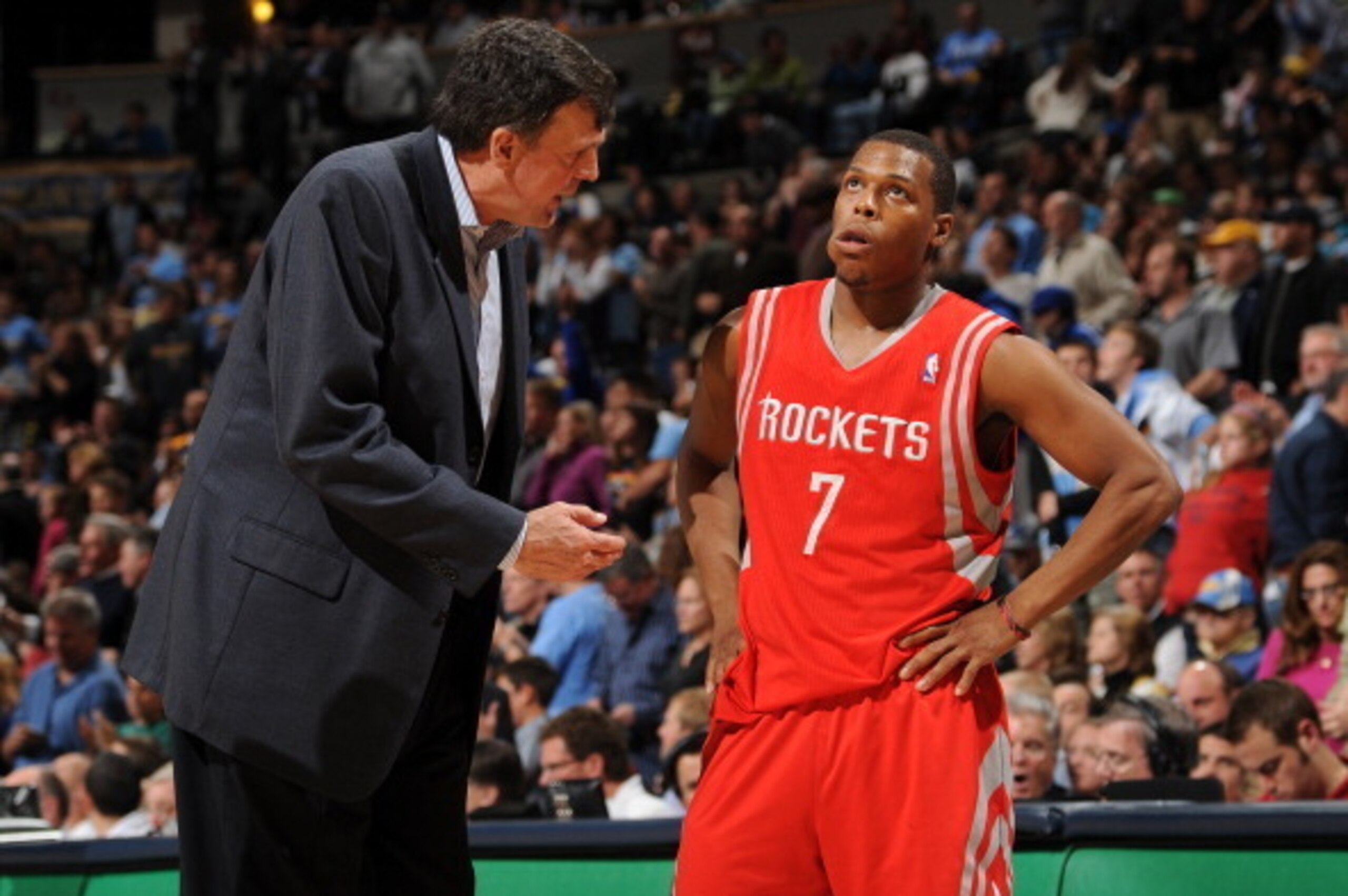 DENVER, CO - APRIL 15: Kevin McHale, head coach of the Houston Rockets, speaks to Kyle Lowry #7 of the Houston Rockets during a game against the Denver Nuggets on April 15, 2012 at the Pepsi Center in Denver, Colorado. NOTE TO USER: User expressly acknowl