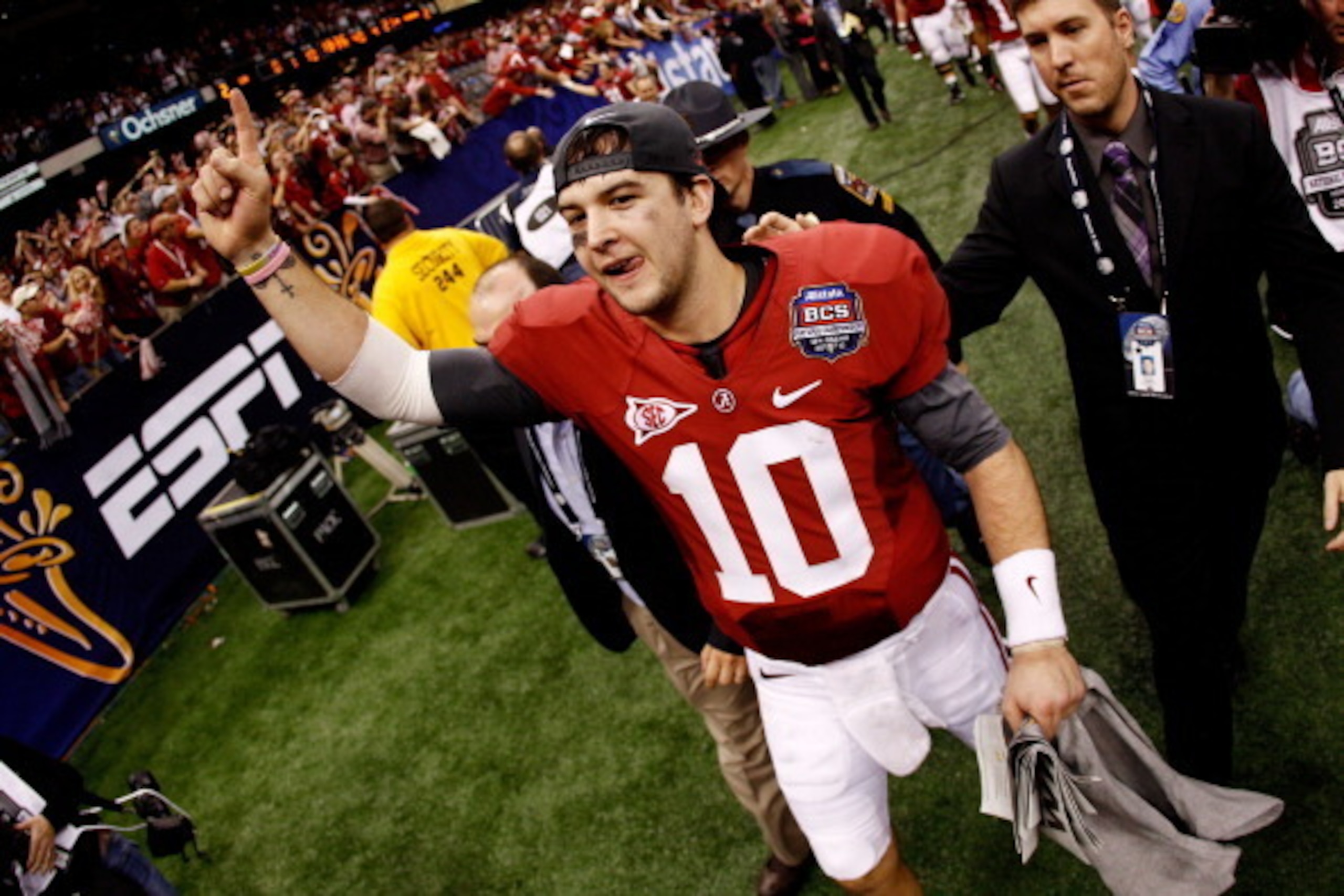 NEW ORLEANS, LA - JANUARY 09:  AJ McCarron #10 of the Alabama Crimson Tide celebrates after defeating Louisiana State University Tigers in the 2012 Allstate BCS National Championship Game at Mercedes-Benz Superdome on January 9, 2012 in New Orleans, Louis