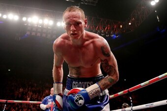 MANCHESTER, ENGLAND - NOVEMBER 23:  George Groves bows to the crowd George Groves after his IBF and WBA World Super Middleweight bout with Carl Froch at Phones4u Arena on November 23, 2013 in Manchester, England.  (Photo by Scott Heavey/Getty Images)