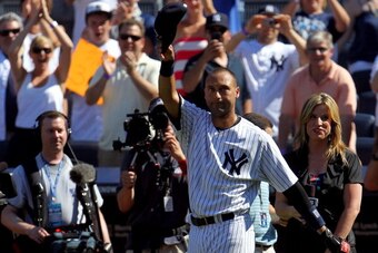 NEW YORK, NY - JULY 09:  Derek Jeter #2 of the New York Yankees waves to the fans after a game in which he hit his 3000th career hit while playing against the Tampa Bay Rays at Yankee Stadium on July 9, 2011 in the Bronx borough of New York City.  (Photo 