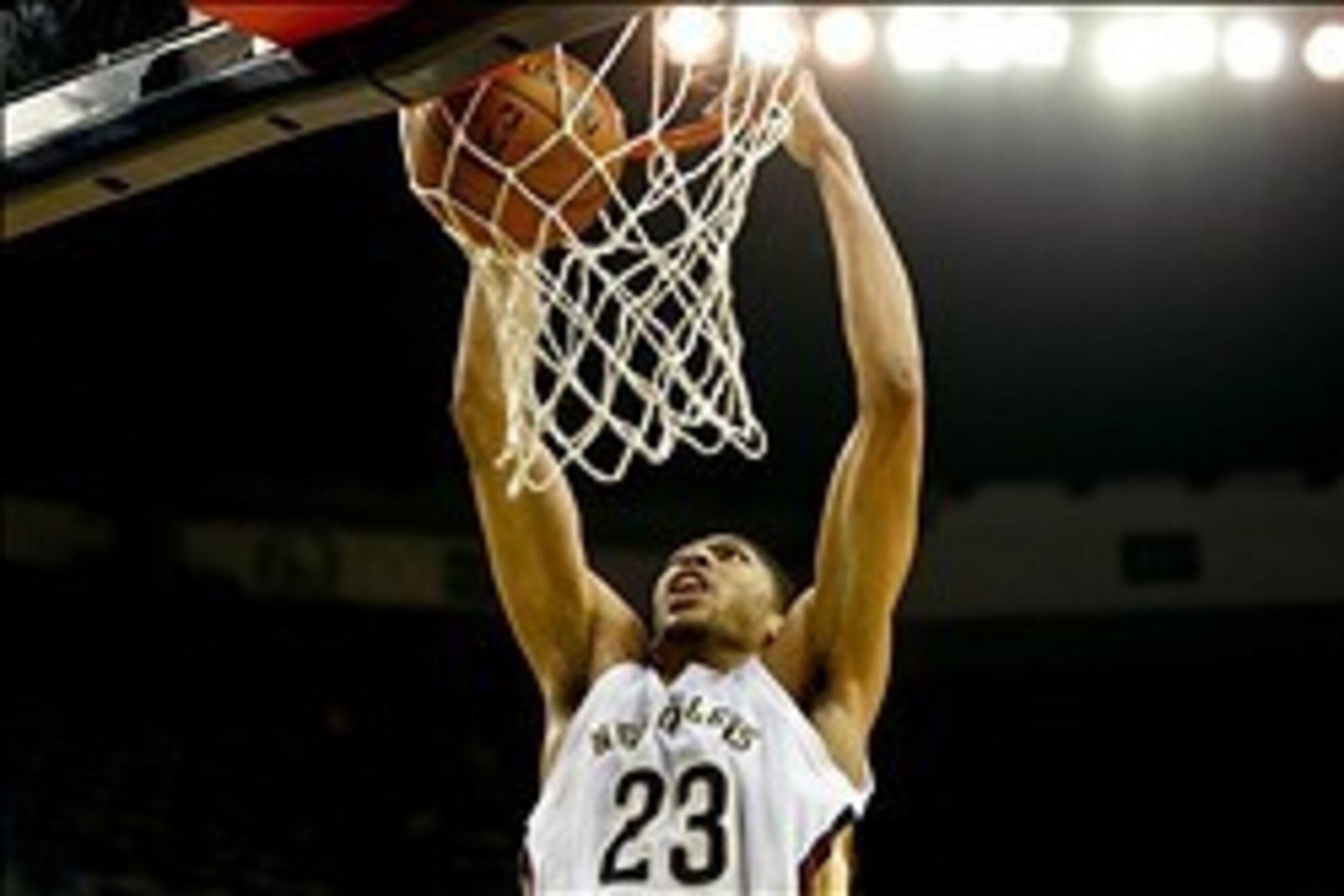 Feb 5, 2014; New Orleans, LA, USA; New Orleans Pelicans power forward Anthony Davis (23) dunks against the Atlanta Hawks during the first quarter of a game at New Orleans Arena. Mandatory Credit: Derick E. Hingle-USA TODAY Sports