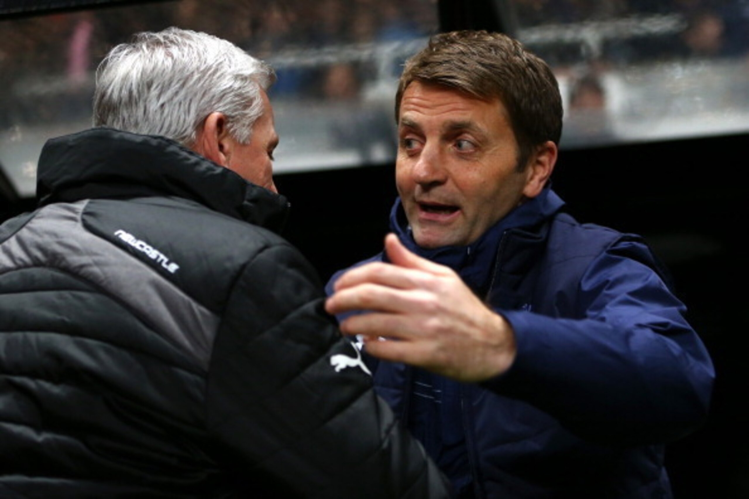 NEWCASTLE UPON TYNE, ENGLAND - FEBRUARY 12:  Alan Pardew manager of Newcastle United greets Tim Sherwood manager of Tottenham Hotspur during the Barclays Premier League match between  Newcastle United and Tottenham Hotspur at St James' Park on February 12