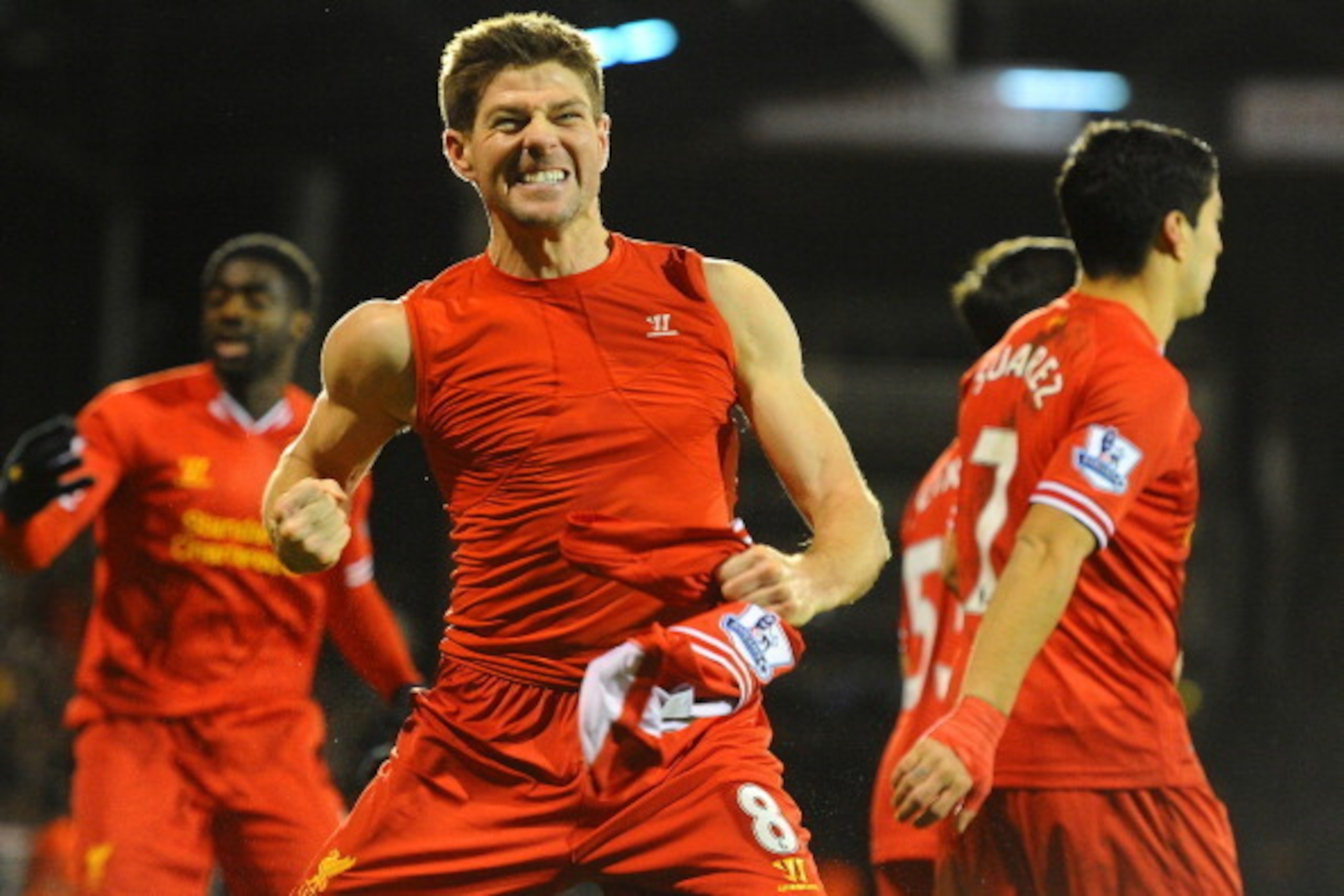 LONDON, ENGLAND - FEBRUARY 12:  Steven Gerrard of Liverpool celebrates scoring their third goal from the penalty spot during the Barclays Premier League match between Fulham and Liverpool at Craven Cottage on February 12, 2014 in London, England.  (Photo 