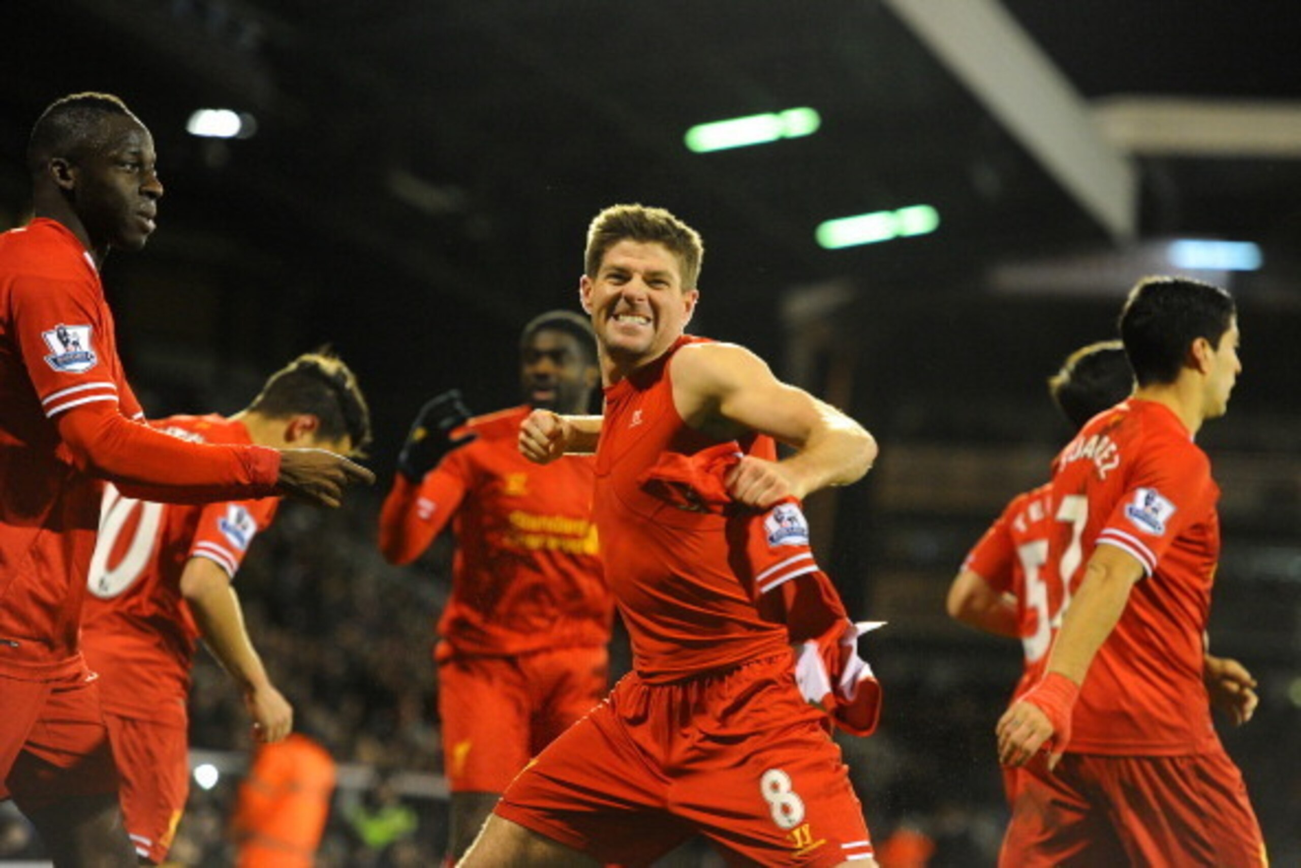 LONDON, ENGLAND - FEBRUARY 12:  Steven Gerrard of Liverpool celebrates scoring their third goal from the penalty spot during the Barclays Premier League match between Fulham and Liverpool at Craven Cottage on February 12, 2014 in London, England.  (Photo 