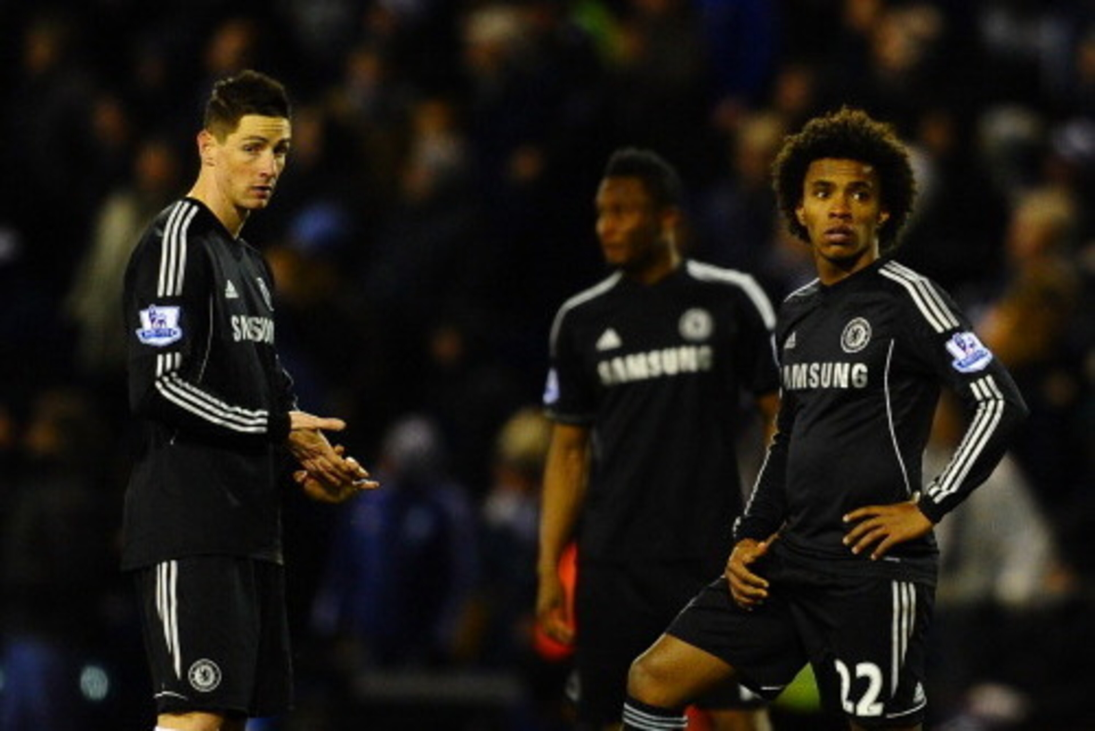 WEST BROMWICH, ENGLAND - FEBRUARY 11:  Fernando Torres and Willian of Chelsea look on during the Barclays Premier League match between West Bromwich Albion and Chelsea at The Hawthorns on February 11, 2014 in West Bromwich, England.  (Photo by Laurence Gr