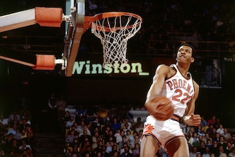 DENVER - JANUARY 28:  Larry Nance #22 of the Phoenix Suns goes for a dunk in the 1984 NBA Slam Dunk Competition during the All-Star Weekend on January 28, 1984 in Denver, Colorado.  NOTE TO USER: User expressly acknowledges and agrees that, by downloading