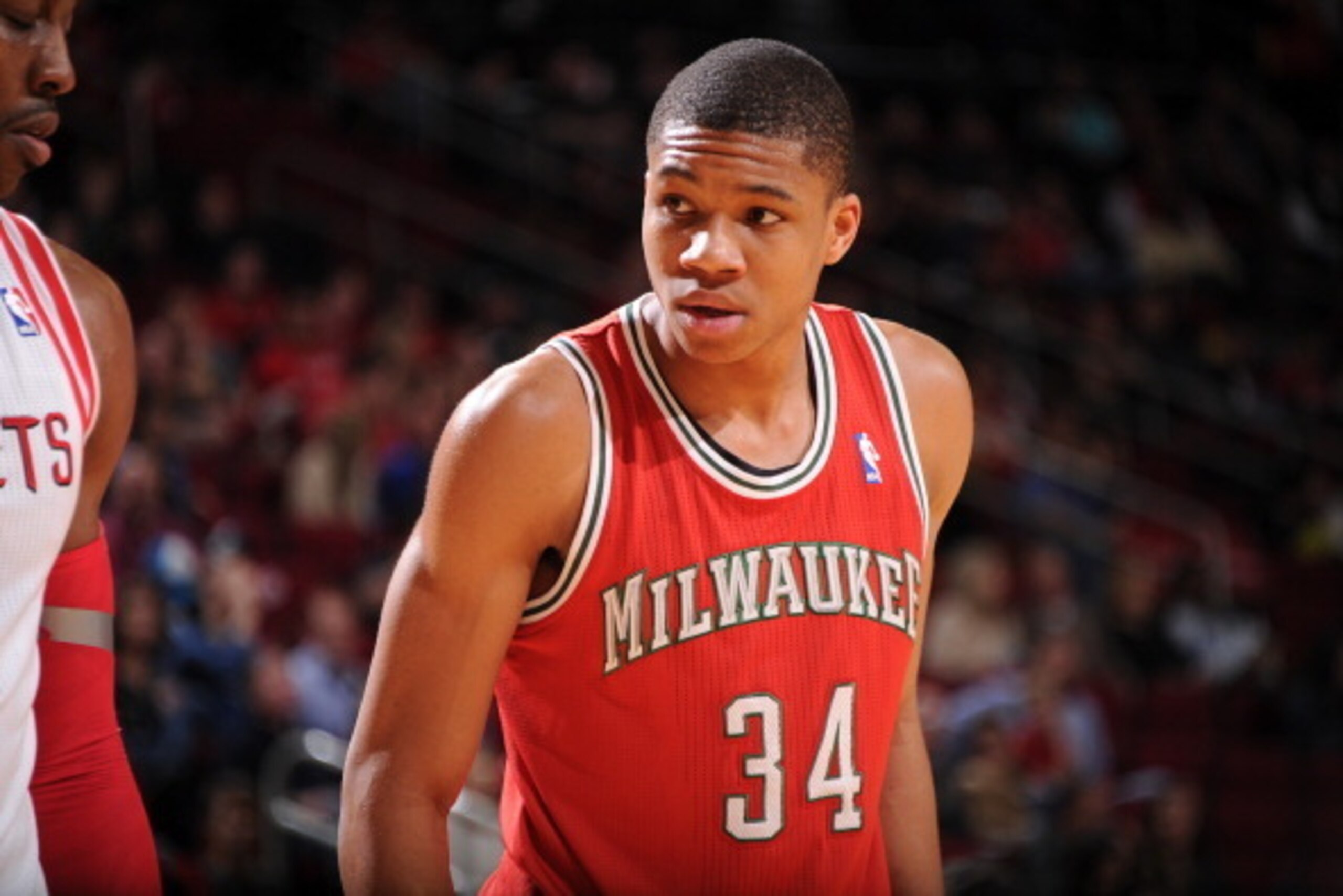 HOUSTON, TX - JANUARY 18:  Giannis Antetokounmpo #34 of the Milwaukee Bucks reacts to a play against the Houston Rockets on January 18, 2014 at the Toyota Center in Houston, Texas. NOTE TO USER: User expressly acknowledges and agrees that, by downloading 