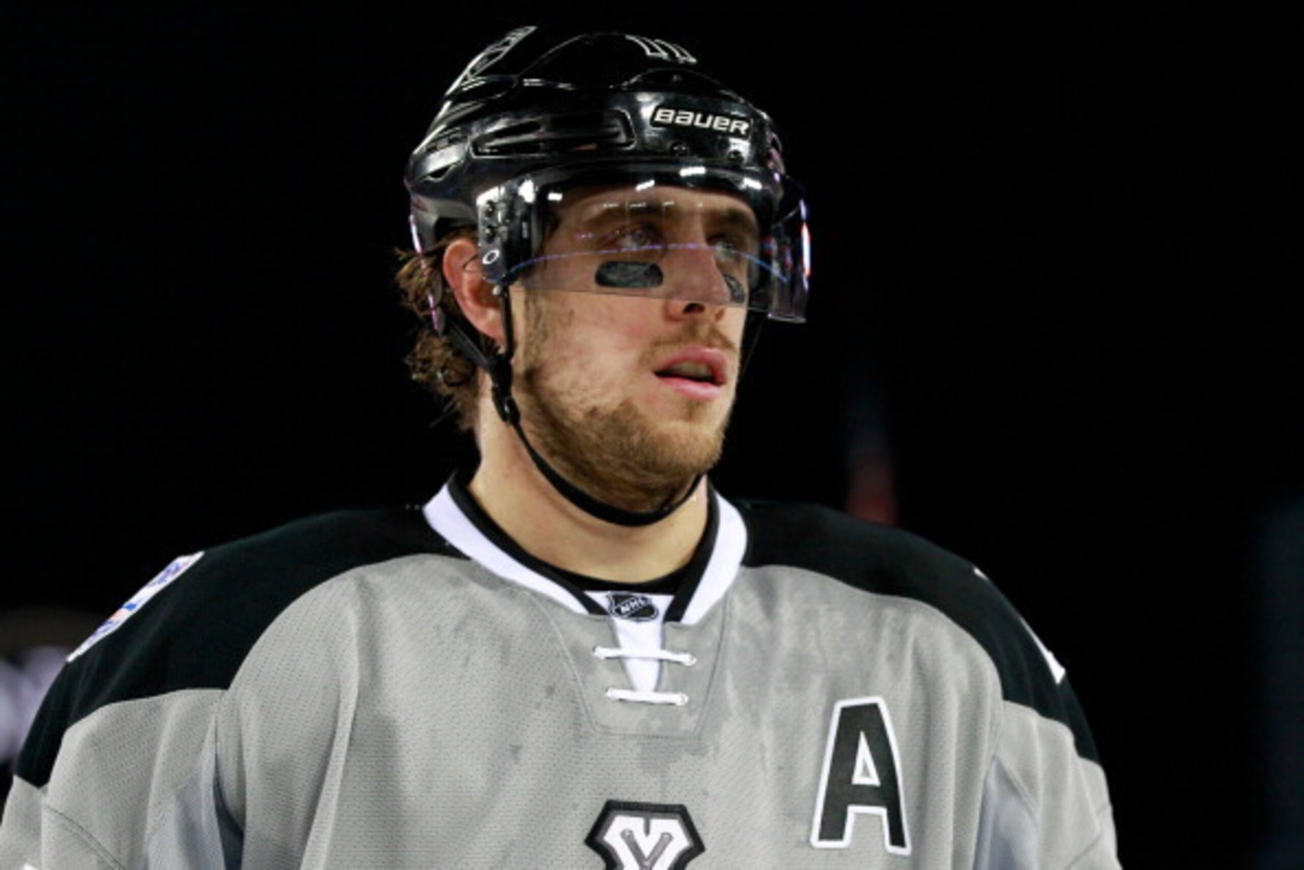 LOS ANGELES, CA - JANUARY 25:  Anze Kopitar #11 of the Los Angeles Kings looks across the ice during the 2014 Coors Light NHL Stadium Series against the Anaheim Ducks at Dodger Stadium on January 25, 2014 in Los Angeles, California.  The Ducks won 3-0.  (