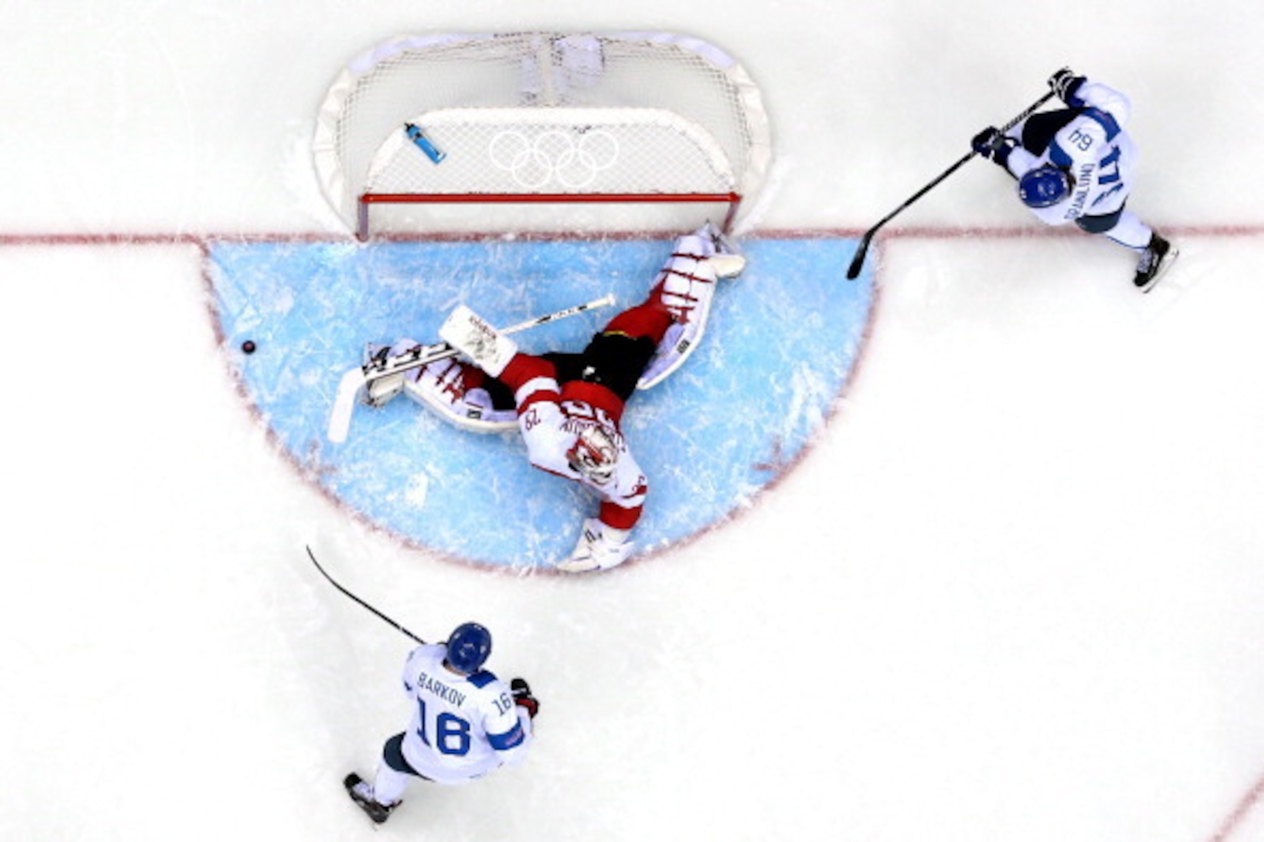 SOCHI, RUSSIA - FEBRUARY 13: Bernhard Starkbaum #29 of Austria makes a save against Finland during the Men's Ice Hockey Preliminary Round Group B game on day six of the Sochi 2014 Winter Olympics at Bolshoy Ice Dome on February 13, 2014 in Sochi, Russia. SOCHI, RUSSIA - FEBRUARY 13: Bernhard Starkbaum #29 of Austria makes a save against Finland during the Men's Ice Hockey Preliminary Round Group B game on day six of the Sochi 2014 Winter Olympics at Bolshoy Ice Dome on February 13, 2014 in Sochi, Russia.