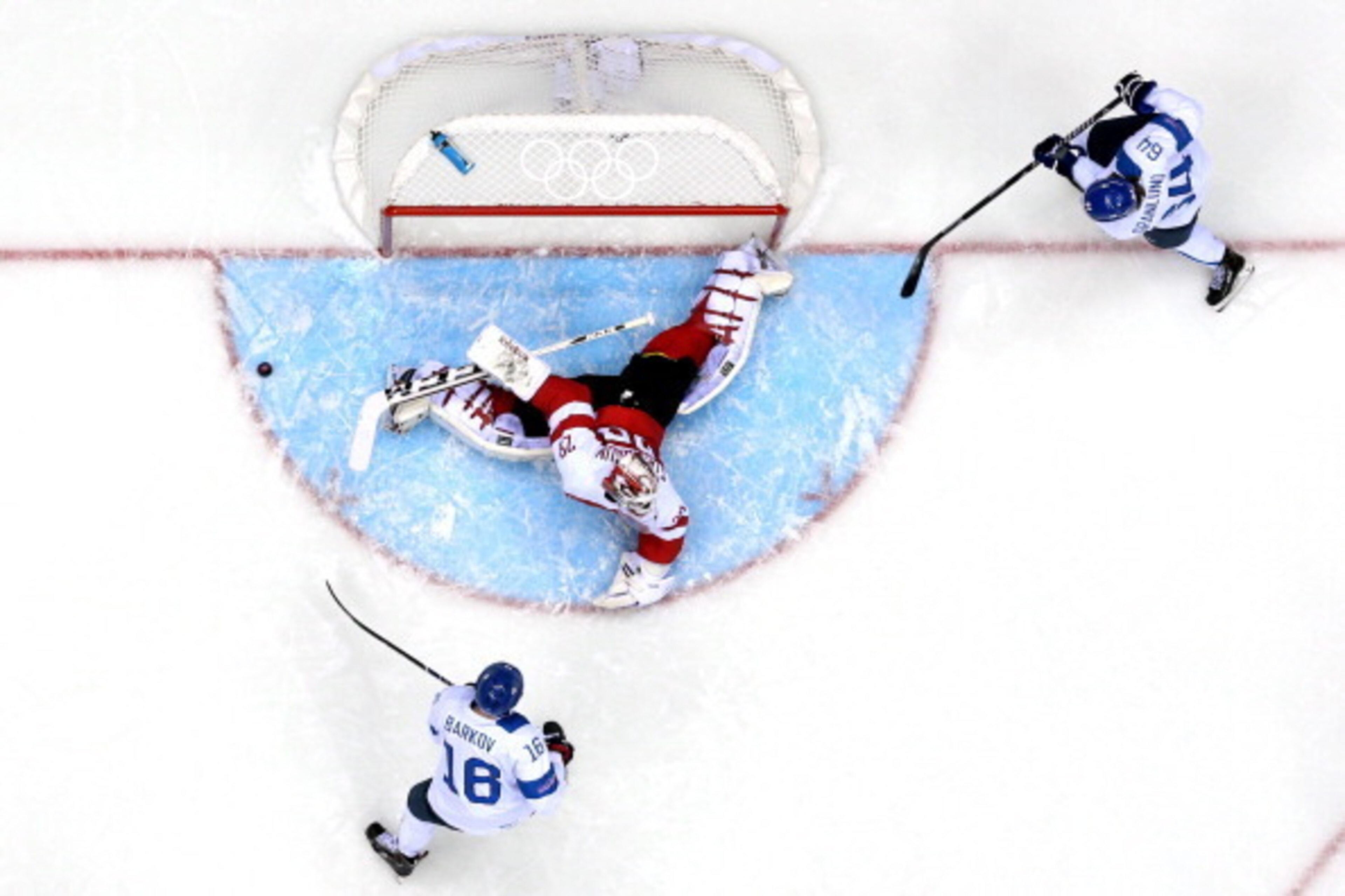 SOCHI, RUSSIA - FEBRUARY 13:  Bernhard Starkbaum #29 of Austria makes a save against Finland during the Men's Ice Hockey Preliminary Round Group B game on day six of the Sochi 2014 Winter Olympics at Bolshoy Ice Dome on February 13, 2014 in Sochi, Russia.