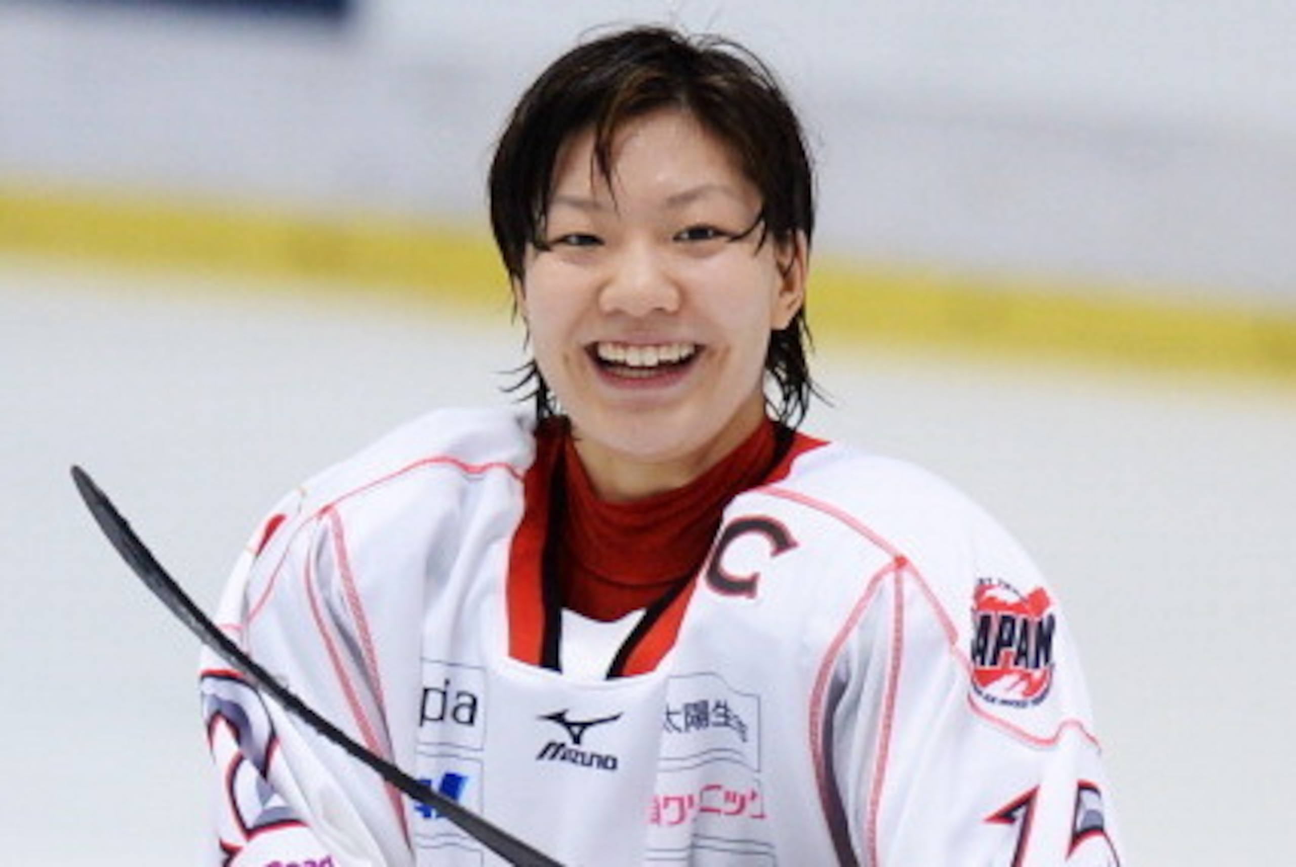 YOKOHAMA, JAPAN - NOVEMBER 09: Chiho Osawa of Japan smiles after victory in the match between Japan and Switzerland during day three of the Ice Hockey Women's 5 Nations Tournament at the Shin Yokohama Skate Center on November 9, 2013 in Yokohama, Japan. YOKOHAMA, JAPAN - NOVEMBER 09: Chiho Osawa of Japan smiles after victory in the match between Japan and Switzerland during day three of the Ice Hockey Women's 5 Nations Tournament at the Shin Yokohama Skate Center on November 9, 2013 in Yokohama, Japan.