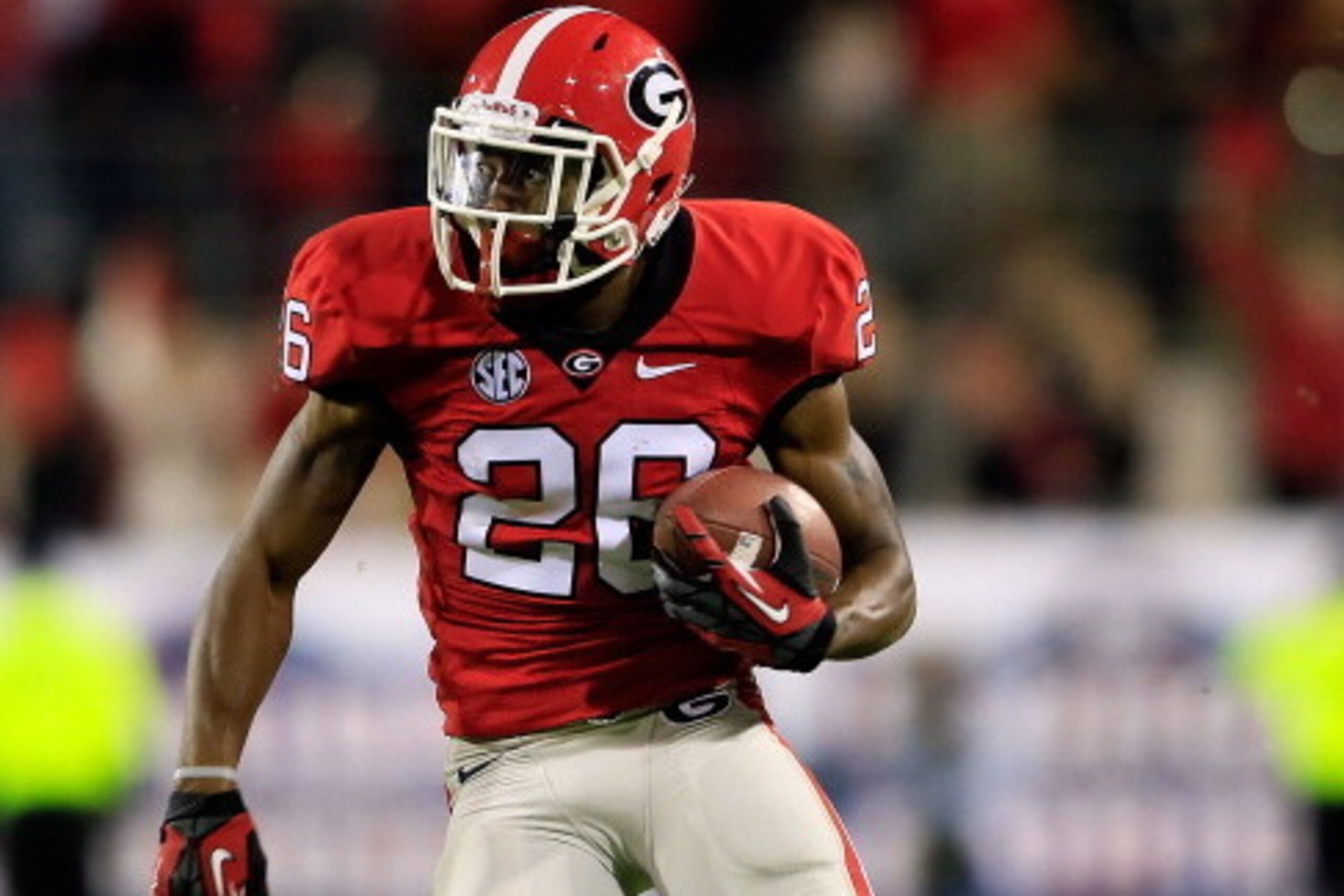 JACKSONVILLE, FL - OCTOBER 27:  Malcolm Mitchell #26 of the Georgia Bulldogs runs for yardage during the game against the Florida Gators at EverBank Field on October 27, 2012 in Jacksonville, Florida.  (Photo by Sam Greenwood/Getty Images)