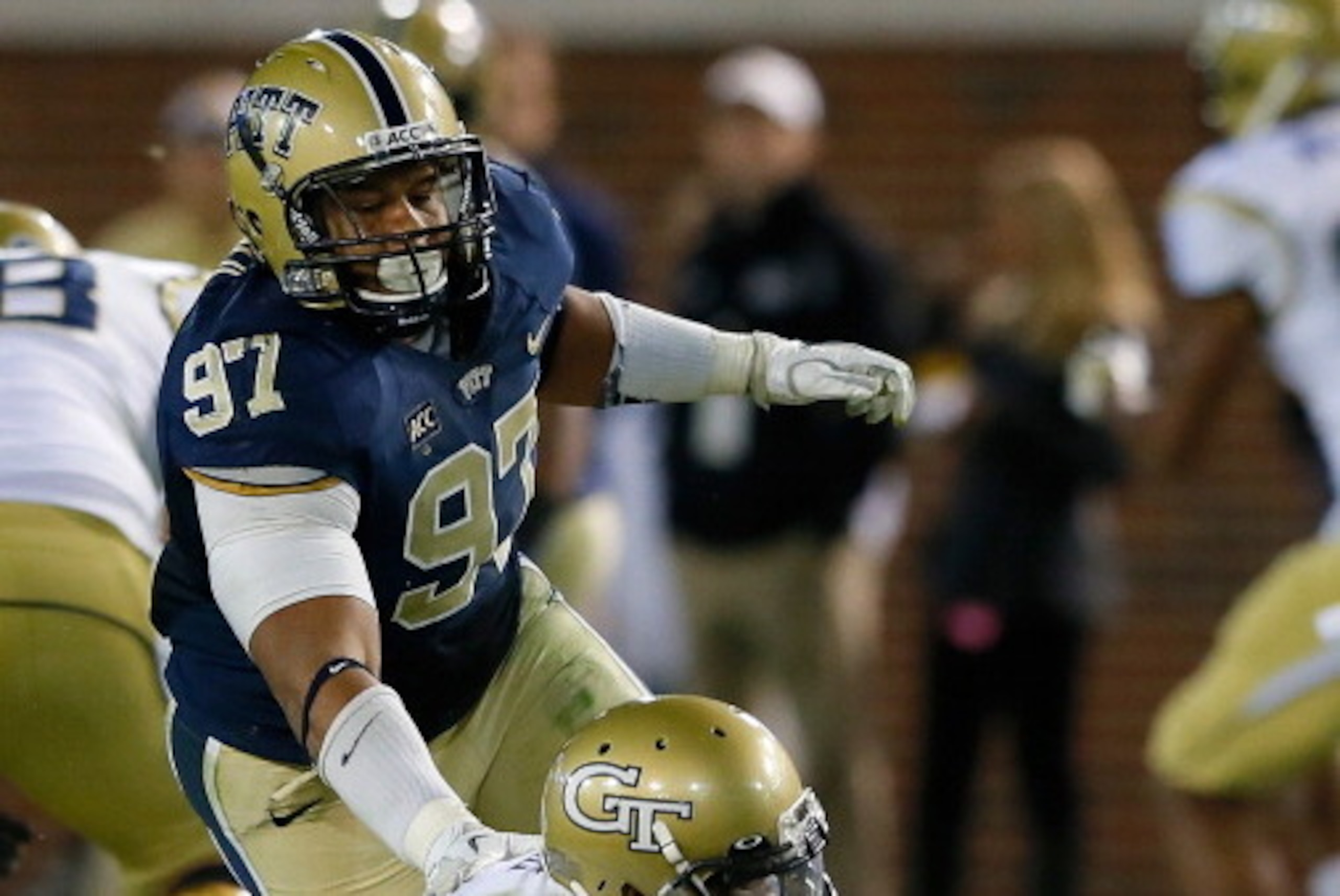ATLANTA, GA - NOVEMBER 02:  Aaron Donald #97 of the Pittsburgh Panthers sacks Vad Lee #2 of the Georgia Tech Yellow Jackets at Bobby Dodd Stadium on November 2, 2013 in Atlanta, Georgia.  (Photo by Kevin C. Cox/Getty Images)
