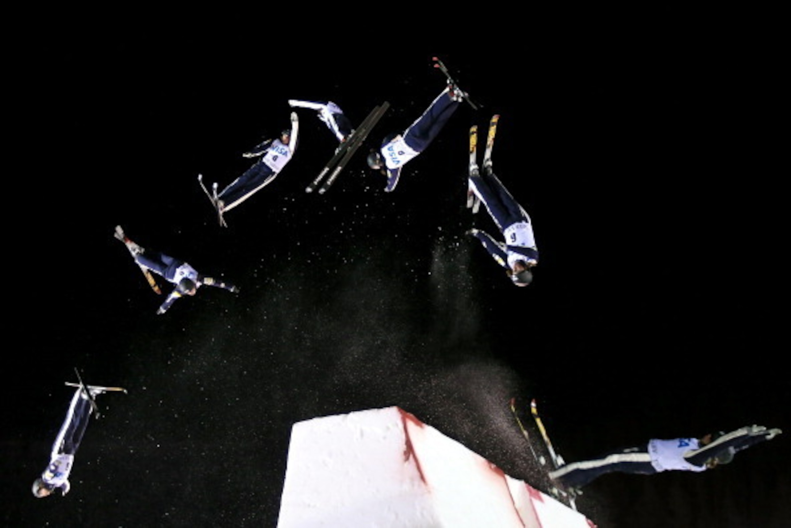PARK CITY, UT - FEBRUARY 01:  (EDITORS NOTE: Multiple exposures were combined in camera to produce this image.) Emily Cook of the USA flies to seventh place in the women's Aerials at the FIS Freestyle Ski World Cup during the Visa Freestyle International 