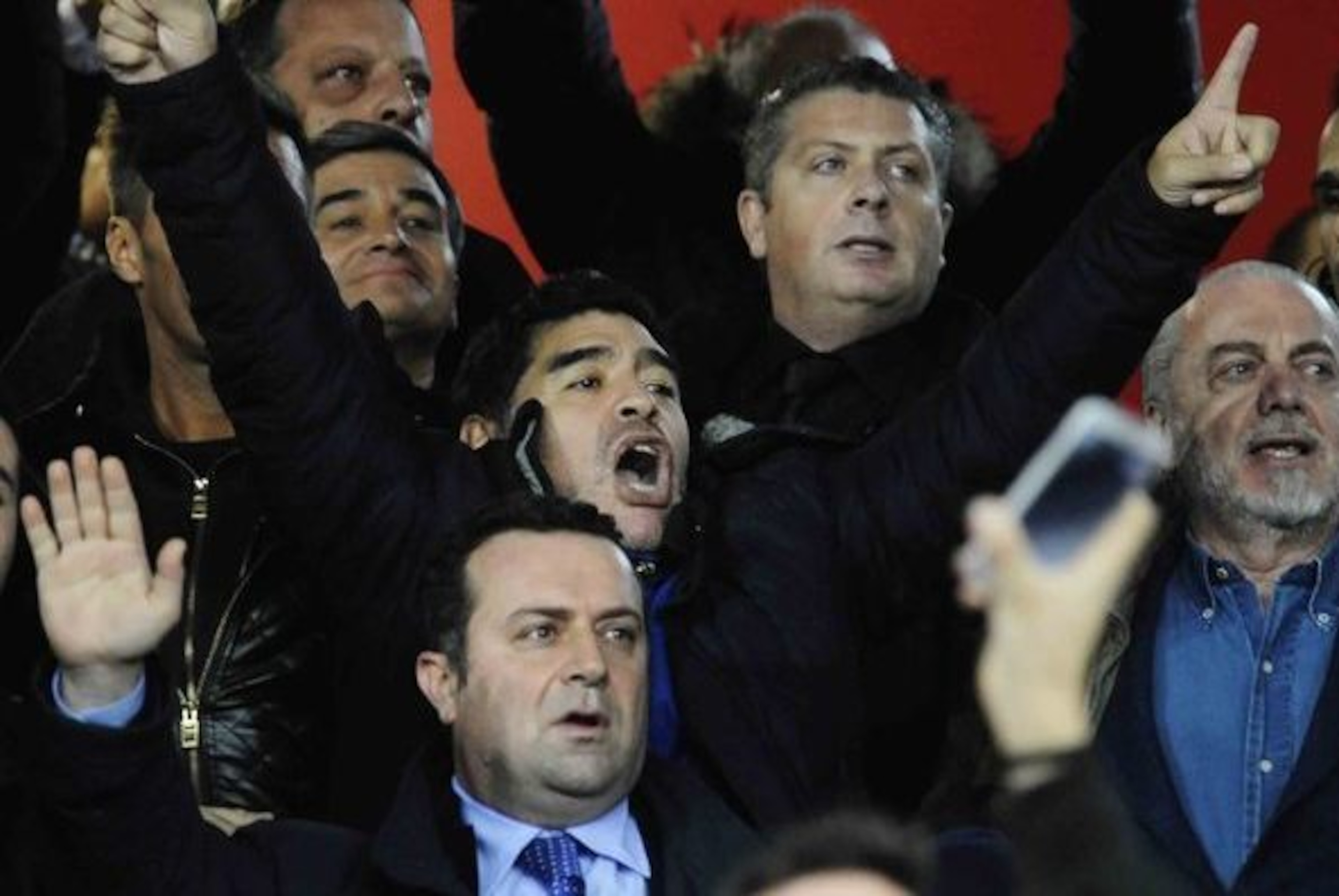 Maradona celebrates during Napoli's win over Roma.