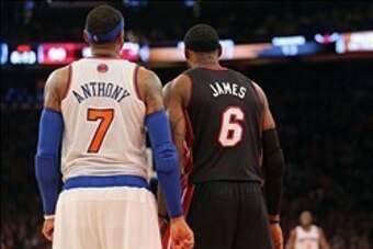 Feb 1, 2014; New York, NY, USA; New York Knicks small forward Carmelo Anthony (7) and Miami Heat small forward LeBron James (6) stand side by side during the fourth quarter of a game at Madison Square Garden. The Heat defeated the Knicks 106-91. Mandatory