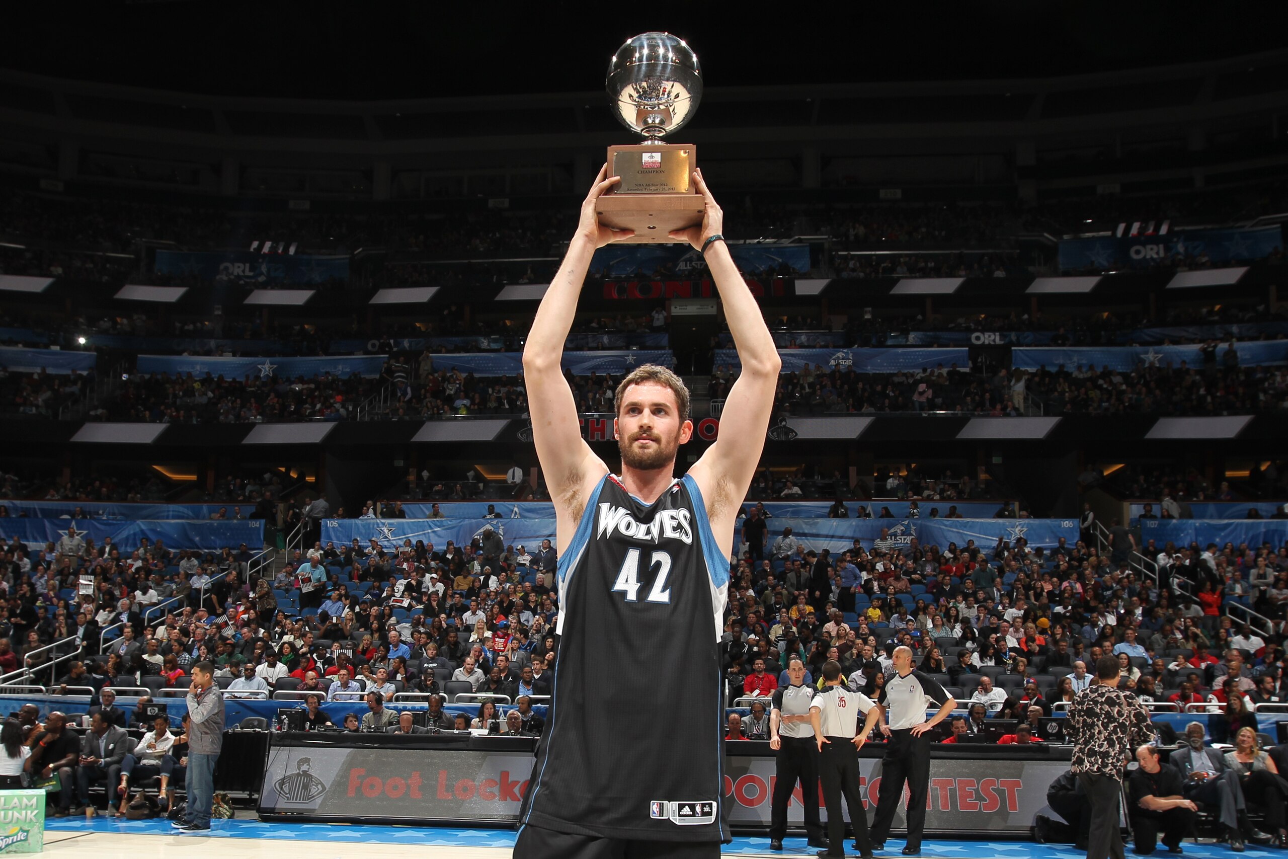 ORLANDO, FL - FEBRUARY 25:  Kevin Love #42 of the Minnesota Timberwolves with his trophy after winning the Foot Locker Three-Point Contest as part of 2012 All-Star Weekend at the Amway Center on February 25, 2012 in Orlando, Florida. NOTE TO USER: User ex