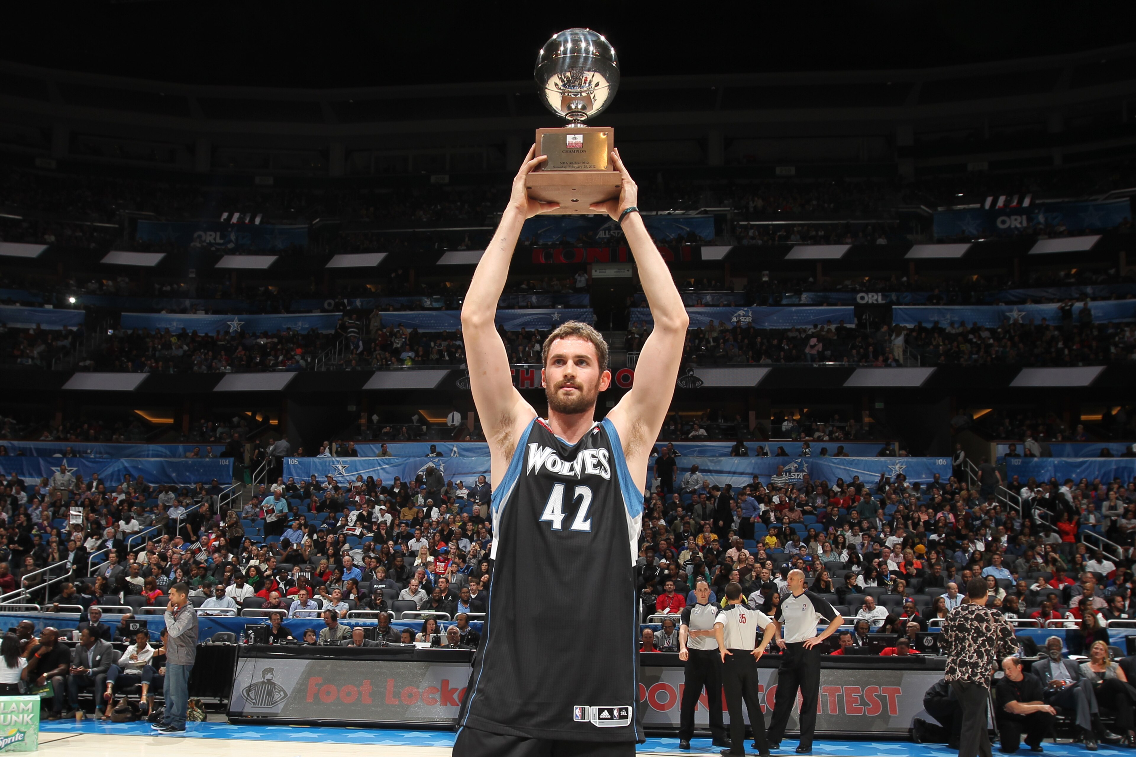 ORLANDO, FL - FEBRUARY 25: Kevin Love #42 of the Minnesota Timberwolves with his trophy after winning the Foot Locker Three-Point Contest as part of 2012 All-Star Weekend at the Amway Center on February 25, 2012 in Orlando, Florida. NOTE TO USER: User ex ORLANDO, FL - FEBRUARY 25: Kevin Love #42 of the Minnesota Timberwolves with his trophy after winning the Foot Locker Three-Point Contest as part of 2012 All-Star Weekend at the Amway Center on February 25, 2012 in Orlando, Florida. NOTE TO USER: User ex