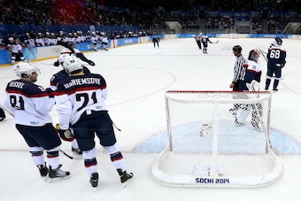 SOCHI, RUSSIA - FEBRUARY 13:  Phil Kessel #81 of United States scores a goal against Slovakia in the second period during the Men's Ice Hockey Preliminary Round Group A game on day six of the Sochi 2014 Winter Olympics at Shayba Arena on February 13, 2014