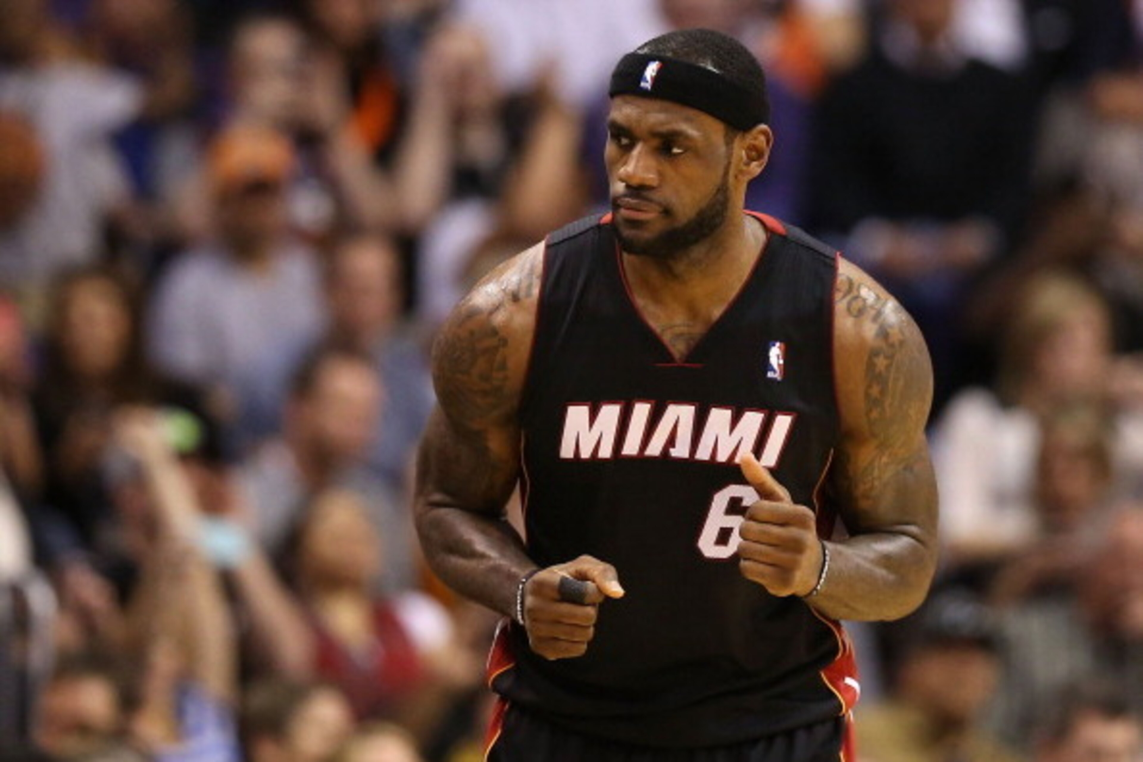 PHOENIX, AZ - FEBRUARY 11:  LeBron James #6 of the Miami Heat during the NBA game against the Phoenix Suns at US Airways Center on February 11, 2014 in Phoenix, Arizona.  The Heat defeated the Suns 103-97.  NOTE TO USER: User expressly acknowledges and ag