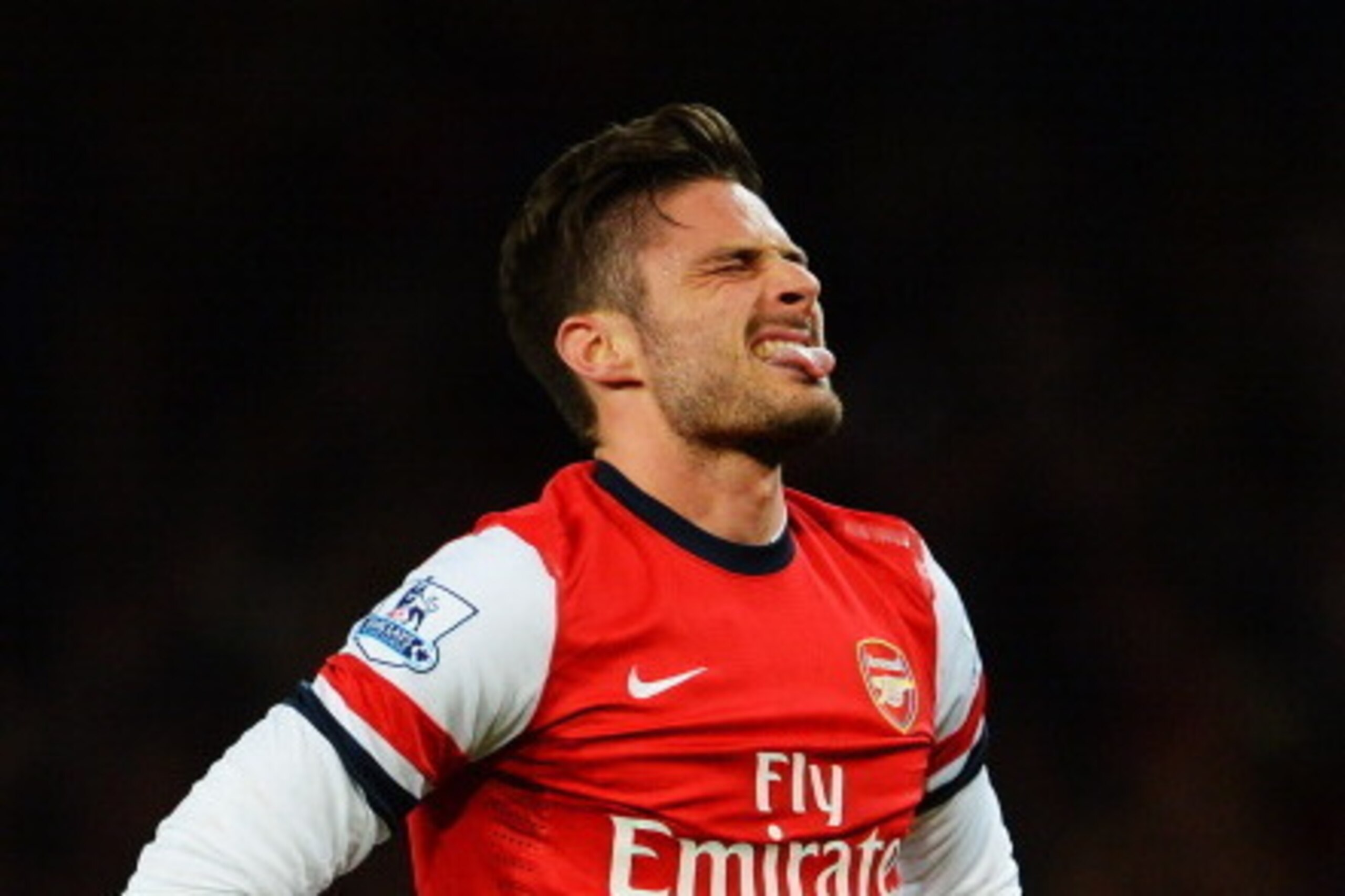 LONDON, ENGLAND - FEBRUARY 12:  Olivier Giroud of Arsenal reacts during the Barclays Premier League match between Arsenal and Manchester United at the Emirates Stadium on February 12, 2014 in London, England.  (Photo by Michael Regan/Getty Images)