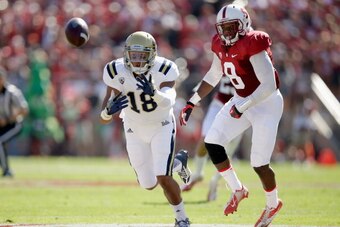 PALO ALTO, CA - OCTOBER 19:  Thomas Duarte #18 of the UCLA Bruins can not catch a pass while defened by Jordan Richards #8 of the Stanford Cardinal at Stanford Stadium on October 19, 2013 in Palo Alto, California.  (Photo by Ezra Shaw/Getty Images)