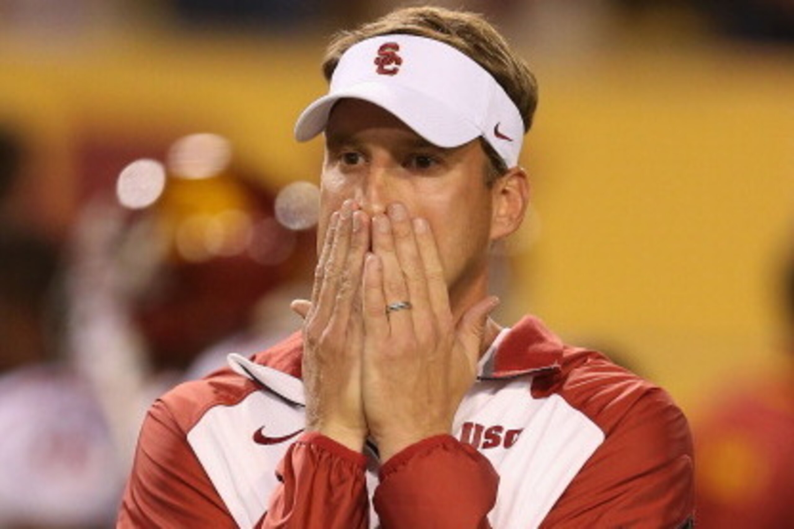 TEMPE, AZ - SEPTEMBER 28:  Head coach Lane Kiffin  of the USC Trojans reacts during the college football game against the Arizona State Sun Devils at Sun Devil Stadium on September 28, 2013 in Tempe, Arizona.  The Sun Devils defeated the Trojans 62-41.  (