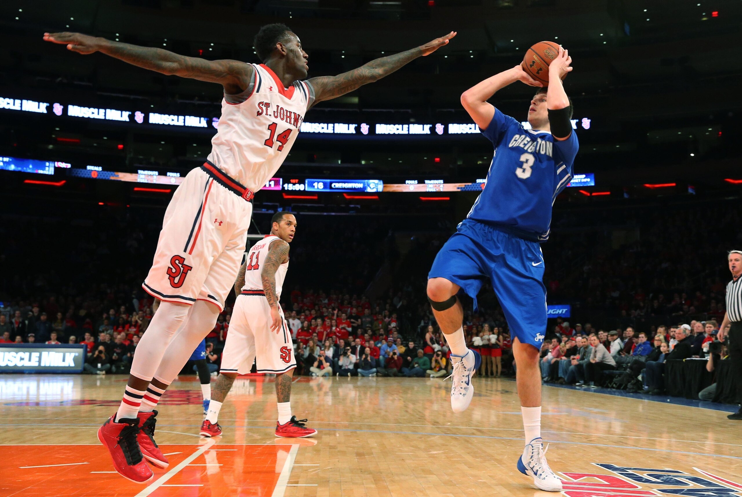 Feb 9, 2014; Jamaica, NY, USA; Creighton Bluejays forward Doug McDermott (3) fades back to shoot over St. John's Red Storm forward Jakarr Sampson (14) during the first half at Madison Square Garden. Mandatory Credit: Anthony Gruppuso-USA TODAY Sports Feb 9, 2014; Jamaica, NY, USA; Creighton Bluejays forward Doug McDermott (3) fades back to shoot over St. John's Red Storm forward Jakarr Sampson (14) during the first half at Madison Square Garden. Mandatory Credit: Anthony Gruppuso-USA TODAY Sports
