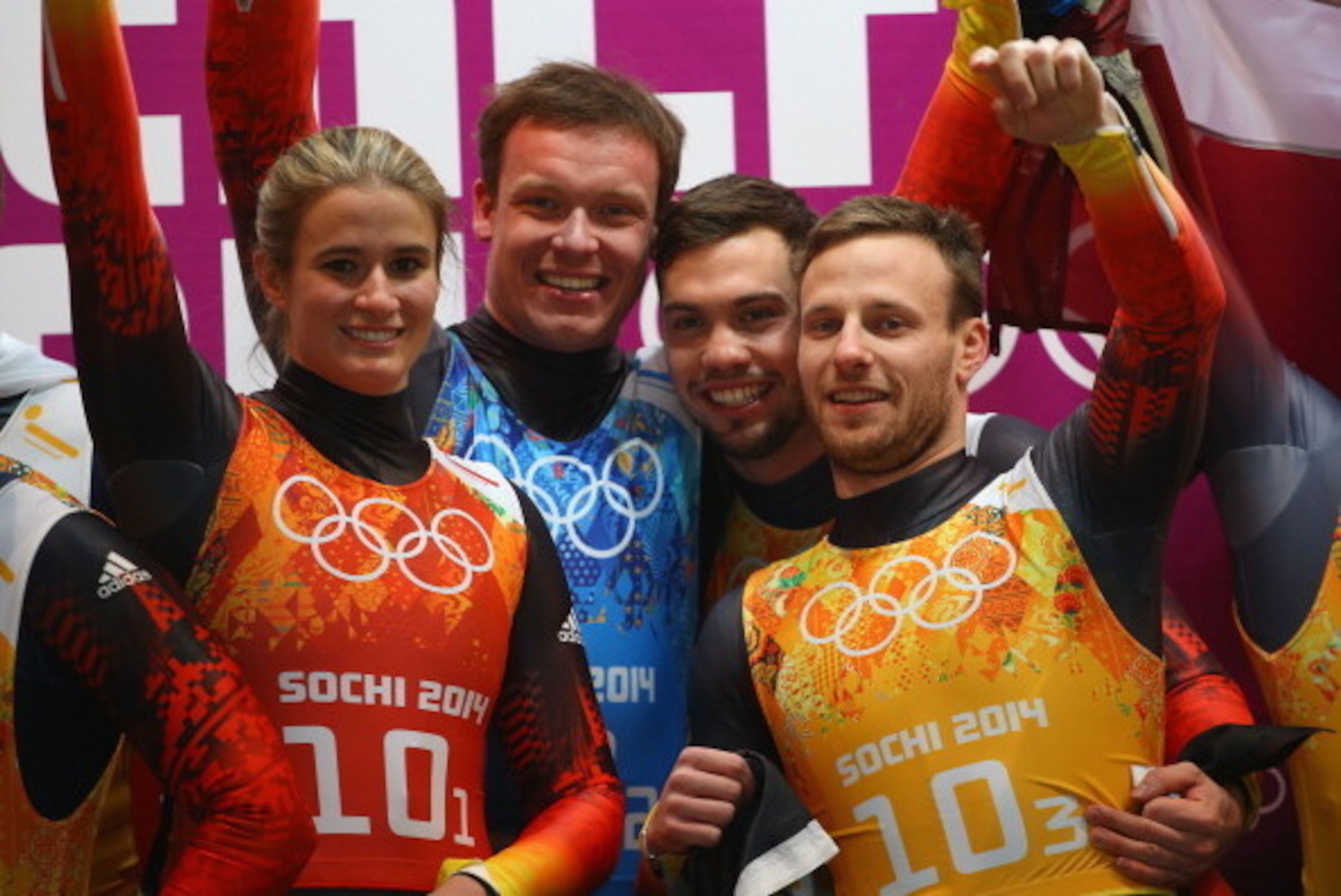 SOCHI, RUSSIA - FEBRUARY 13: (L-R) Gold medalists Natalie Geisenberger, Felix Loch, Tobias Wendl and Tobias Arlt of Germany celebrate during the flower ceremony for the the Luge Relay on Day 6 of the Sochi 2014 Winter Olympics at Sliding Center Sanki on SOCHI, RUSSIA - FEBRUARY 13: (L-R) Gold medalists Natalie Geisenberger, Felix Loch, Tobias Wendl and Tobias Arlt of Germany celebrate during the flower ceremony for the the Luge Relay on Day 6 of the Sochi 2014 Winter Olympics at Sliding Center Sanki on