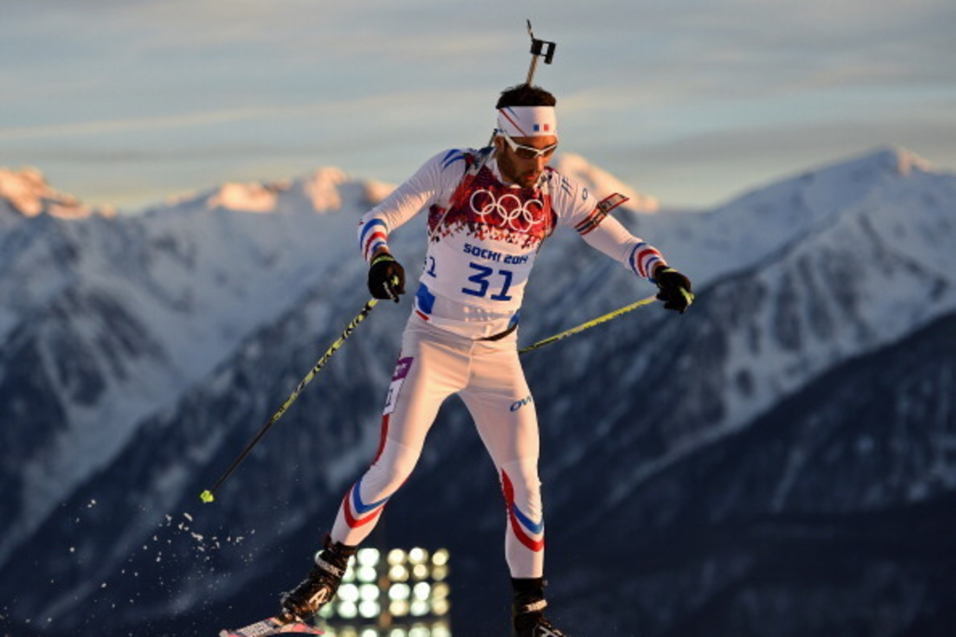 SOCHI, RUSSIA - FEBRUARY 13: Martin Fourcade of France competes in the Men's Individual 20 km during day six of the Sochi 2014 Winter Olympics at Laura Cross-country Ski & Biathlon Center on February 13, 2014 in Sochi, Russia. (Photo by Lars Baron/Getty SOCHI, RUSSIA - FEBRUARY 13: Martin Fourcade of France competes in the Men's Individual 20 km during day six of the Sochi 2014 Winter Olympics at Laura Cross-country Ski & Biathlon Center on February 13, 2014 in Sochi, Russia. (Photo by Lars Baron/Getty