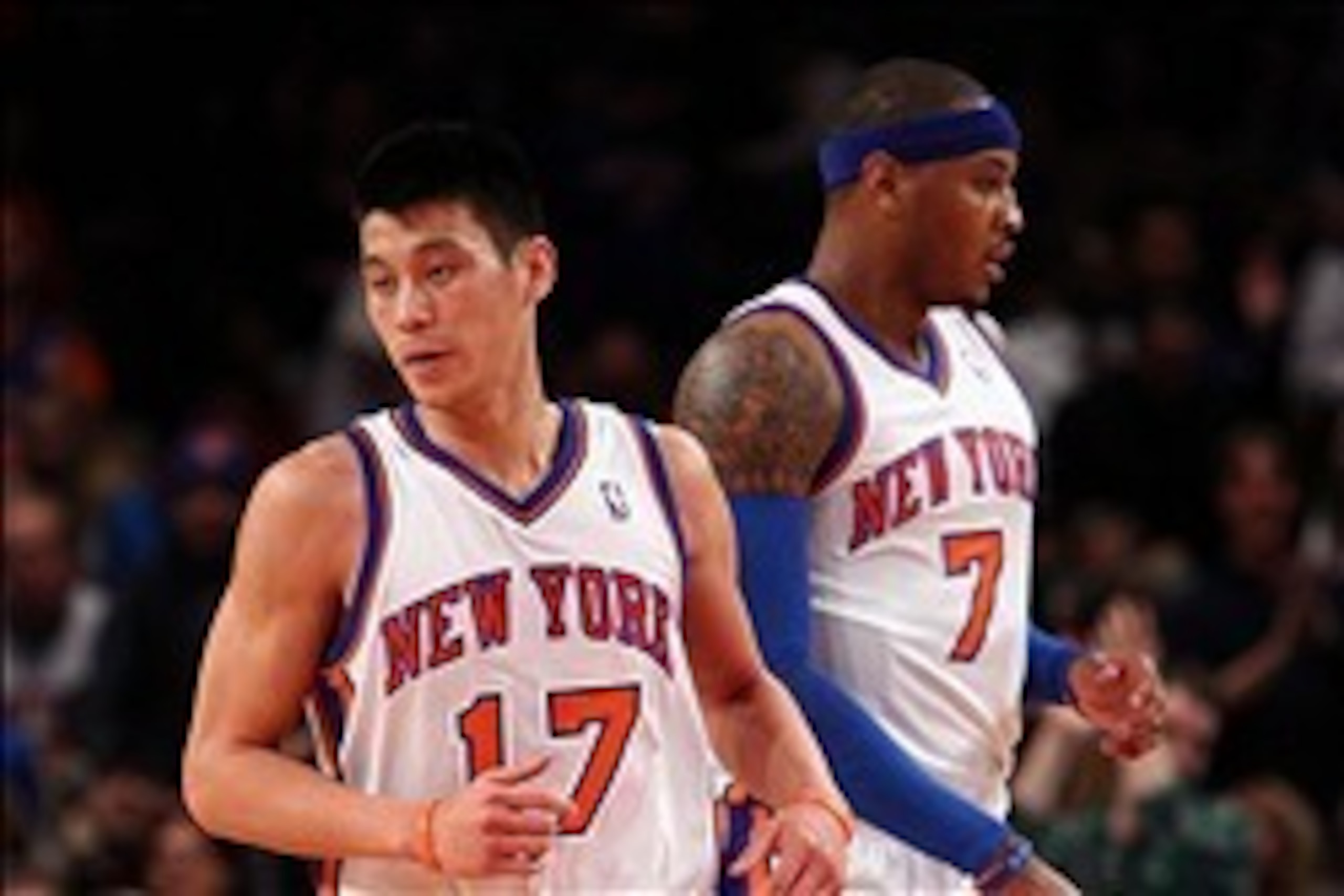 Feb. 20, 2012; New York, NY, USA; New York Knicks point guard Jeremy Lin (17) and small forward Carmelo Anthony (7) react during the first half against the New Jersey Nets at Madison Square Garden.  Mandatory Credit: Debby Wong-USA TODAY Sports