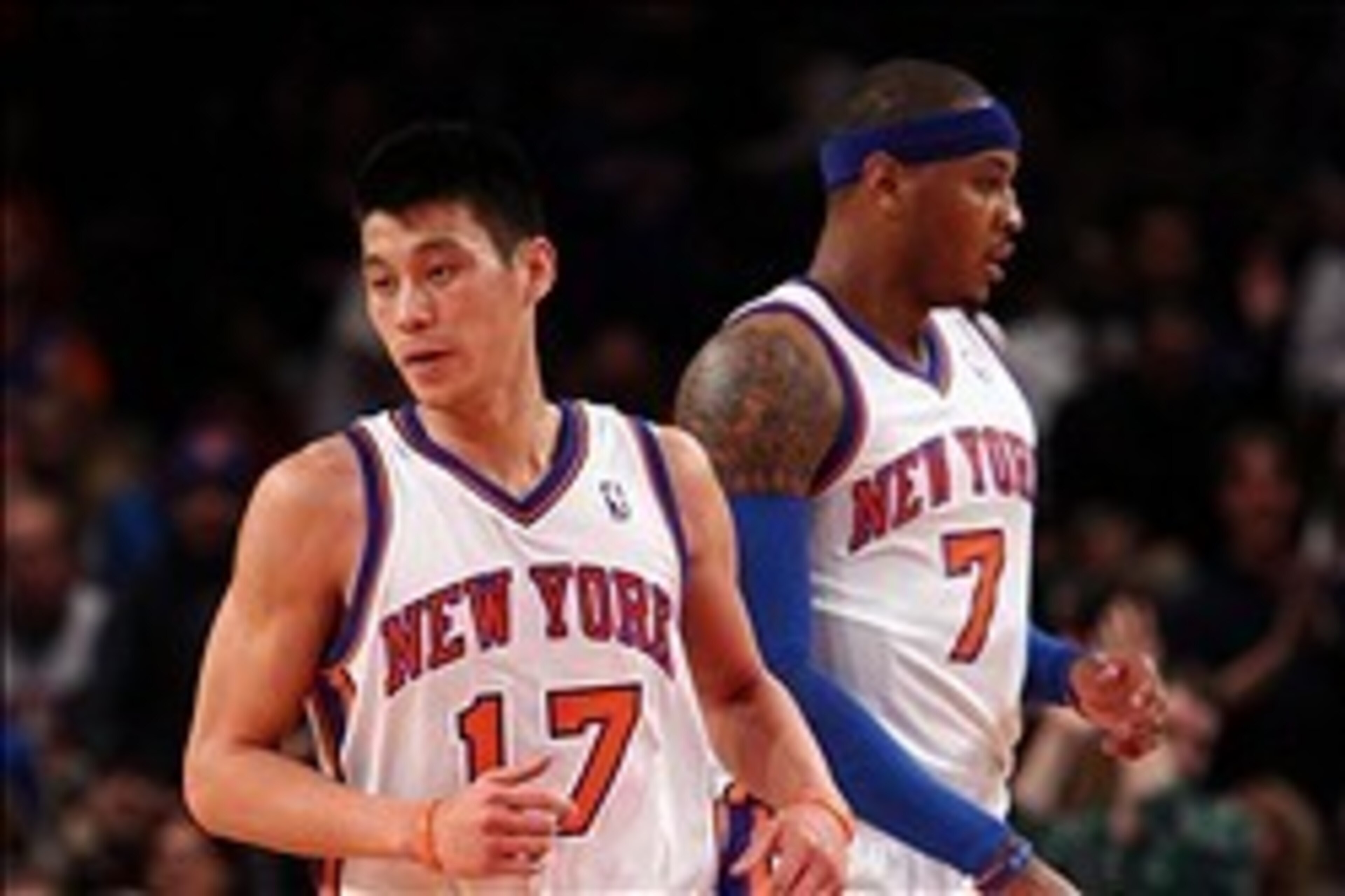Feb. 20, 2012; New York, NY, USA; New York Knicks point guard Jeremy Lin (17) and small forward Carmelo Anthony (7) react during the first half against the New Jersey Nets at Madison Square Garden.  Mandatory Credit: Debby Wong-USA TODAY Sports