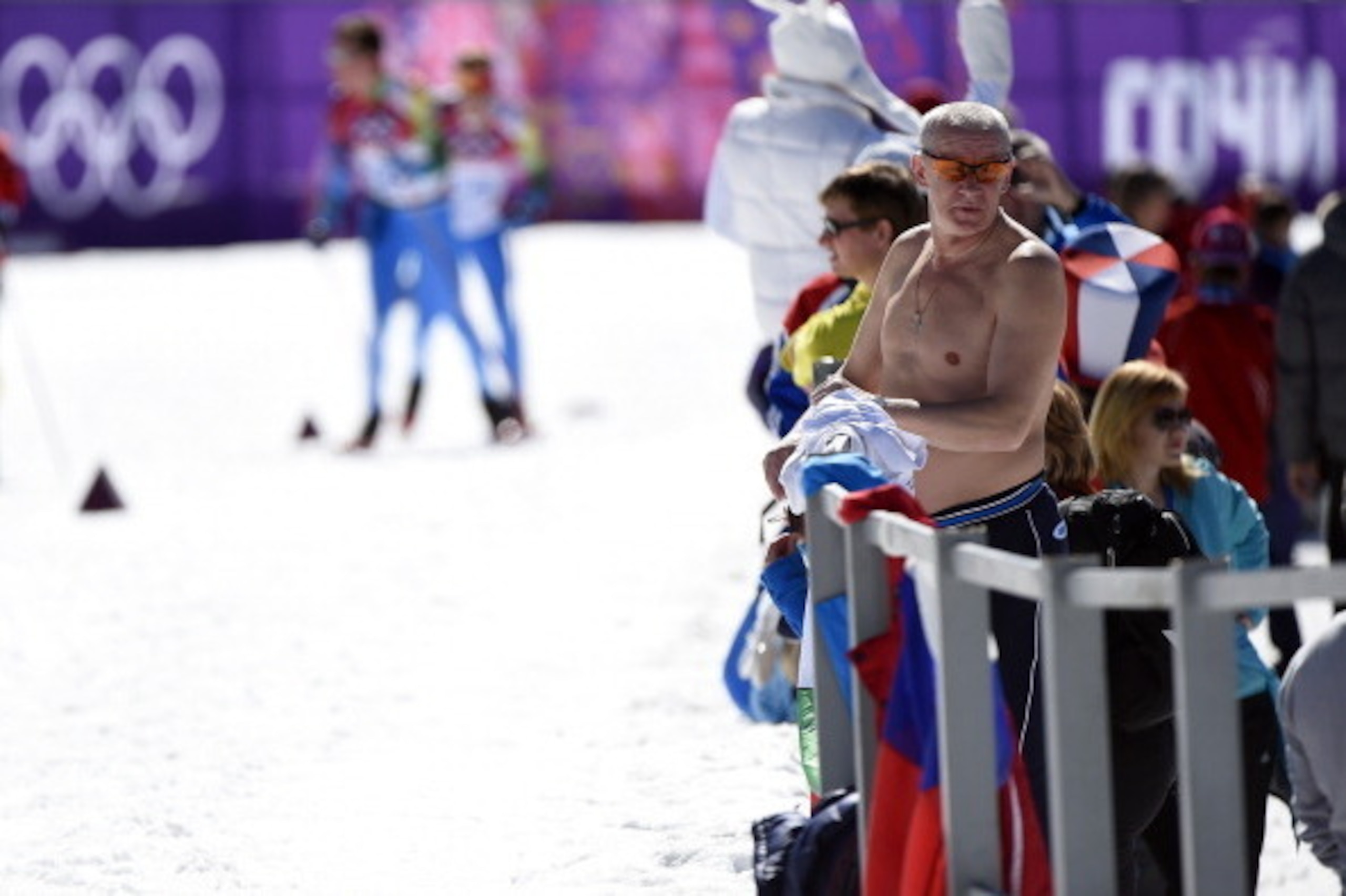 SOCHI, RUSSIA - FEBRUARY 13: A shirtless fan watches the Women's 10 km Classic during day six of the Sochi 2014 Winter Olympics at Laura Cross-country Ski & Biathlon Center on February 13, 2014 in Sochi, Russia. (Photo by Lars Baron/Getty Images) SOCHI, RUSSIA - FEBRUARY 13: A shirtless fan watches the Women's 10 km Classic during day six of the Sochi 2014 Winter Olympics at Laura Cross-country Ski & Biathlon Center on February 13, 2014 in Sochi, Russia. (Photo by Lars Baron/Getty Images)