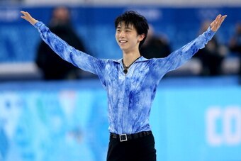 SOCHI, RUSSIA - FEBRUARY 13:  Yuzuru Hanyu of Japan competes during the Men's Figure Skating Short Program on day 6 of the Sochi 2014 Winter Olympics at the at Iceberg Skating Palace on February 13, 2014 in Sochi, Russia.  (Photo by Matthew Stockman/Getty