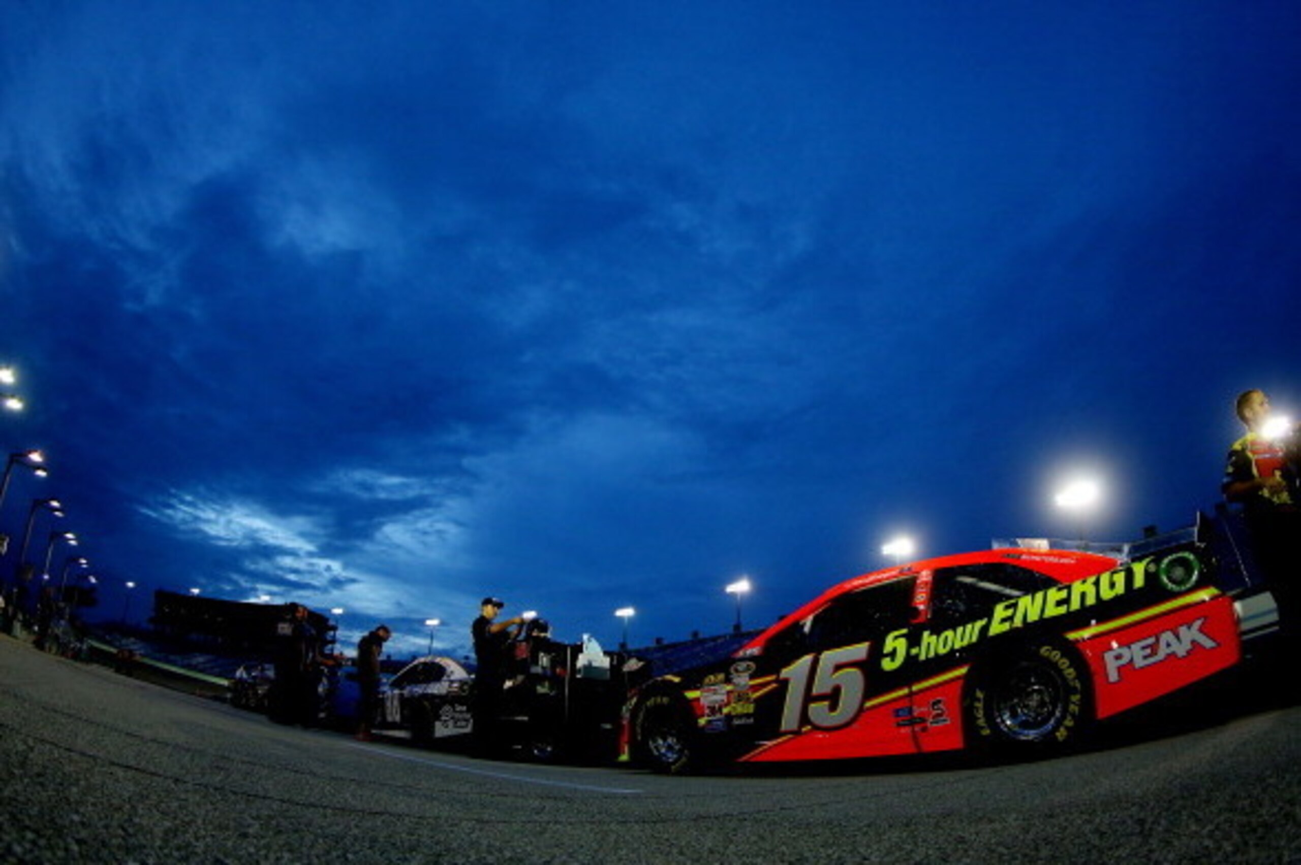 HOMESTEAD, FL - NOVEMBER 15: The #15 5-hour ENERGY Toyota, driven by Clint Bowyer, sits on the grid during qualifying for the NASCAR Sprint Cup Series Ford EcoBoost 400 at Homestead-Miami Speedway on November 15, 2013 in Homestead, Florida. (Photo by Mik HOMESTEAD, FL - NOVEMBER 15: The #15 5-hour ENERGY Toyota, driven by Clint Bowyer, sits on the grid during qualifying for the NASCAR Sprint Cup Series Ford EcoBoost 400 at Homestead-Miami Speedway on November 15, 2013 in Homestead, Florida. (Photo by Mik