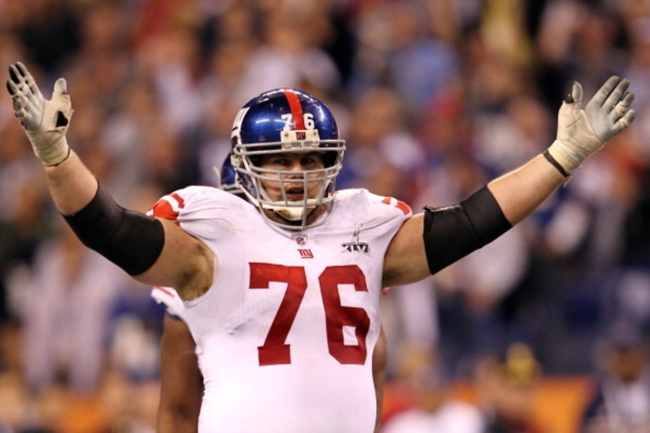 INDIANAPOLIS, IN - FEBRUARY 05:  Chris Snee #76 of the New York Giants celebrates against the New England Patriots during Super Bowl XLVI at Lucas Oil Stadium on February 5, 2012 in Indianapolis, Indiana.  (Photo by Jamie Squire/Getty Images)
