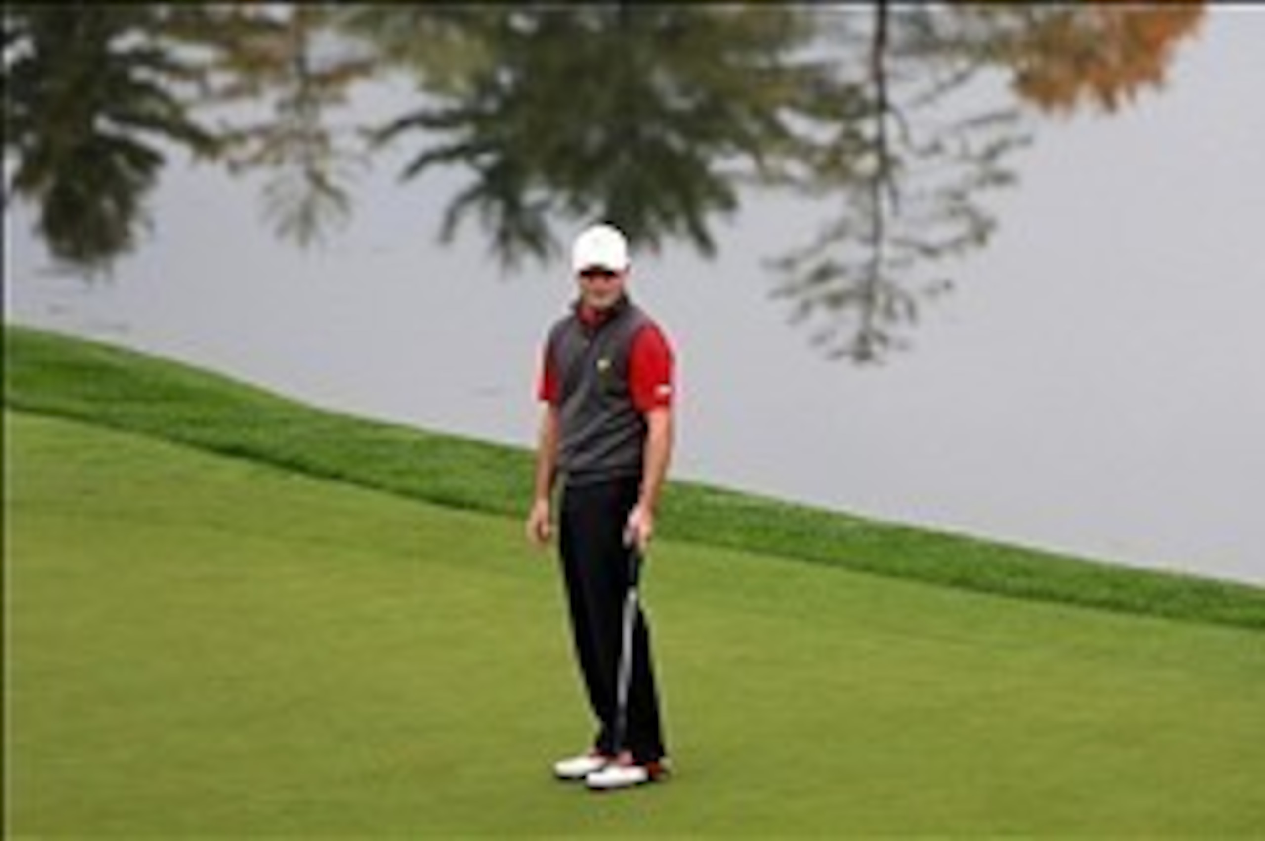 Oct 5, 2013; Dublin, OH, USA; Zach Johnson reacts to his putt on the 16th green during the second round of the Presidents Cup at Muirfield Village Golf Club. Mandatory Credit: Allan Henry-USA TODAY Sports