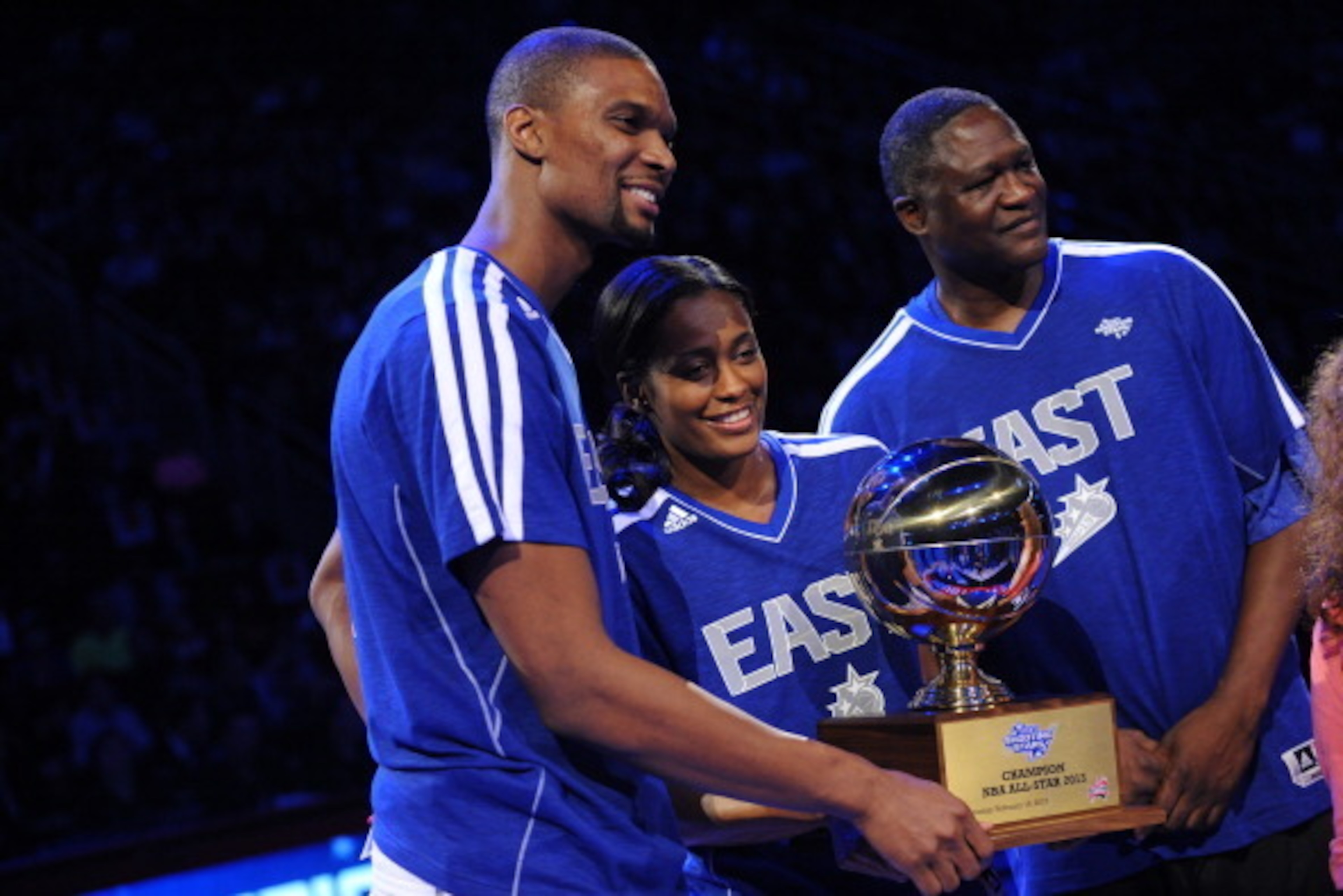 HOUSTON, TX - FEBRUARY 16: Chris Bosh, Swin Cash, and Dominique Wilkins of Team Bosh are presented the Sears Schooting Stars trophy during 2013 Sears Shooting Stars Competition on State Farm All-Star Saturday Night as part of 2013 NBA All-Star Weekend on 