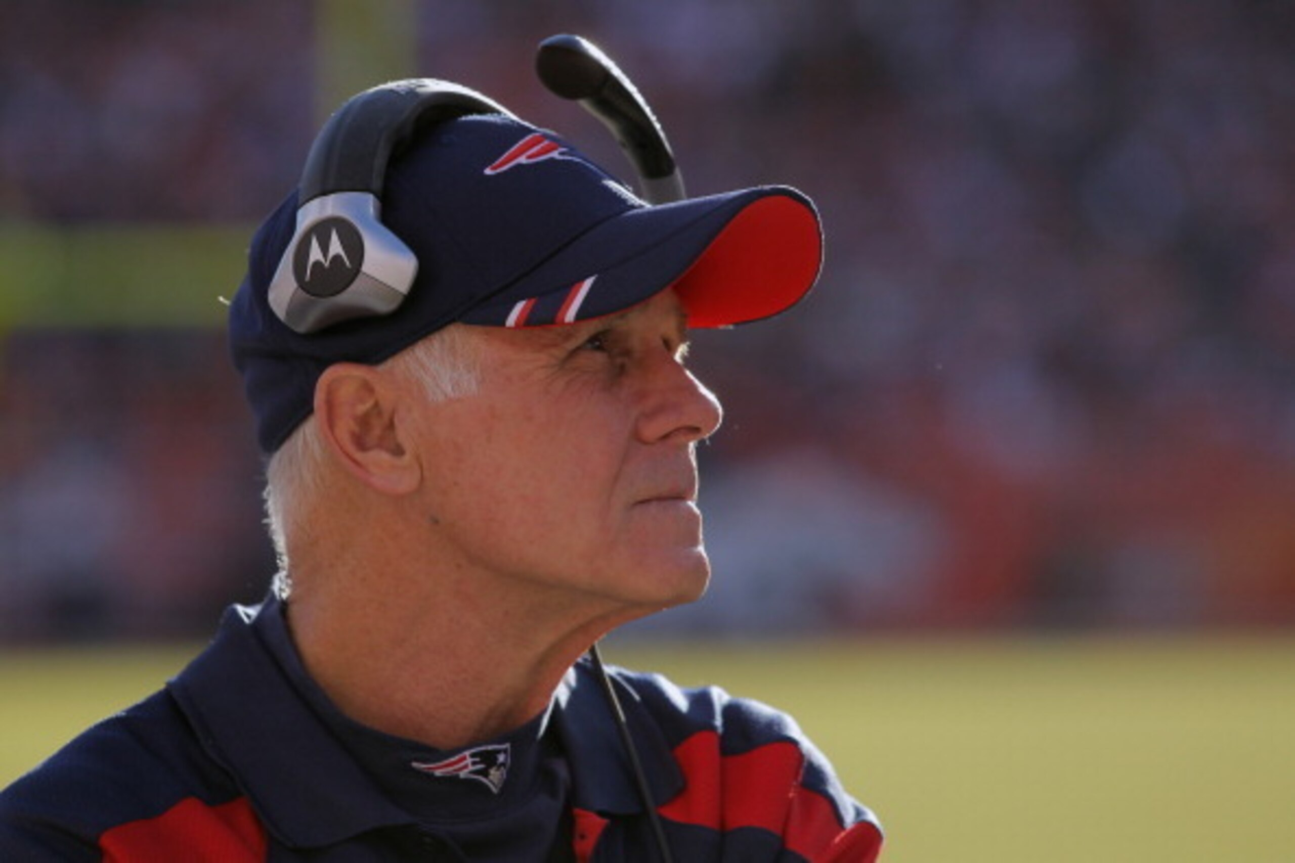 DENVER, CO - DECEMBER 18:  Dante Scarnecchia, Assistant Head Coach / Offensive Line coach of the New England Patriots looks on from the sideline against the Denver Broncos at Sports Authority Field at Mile High on December 18, 2011 in Denver, Colorado. Th