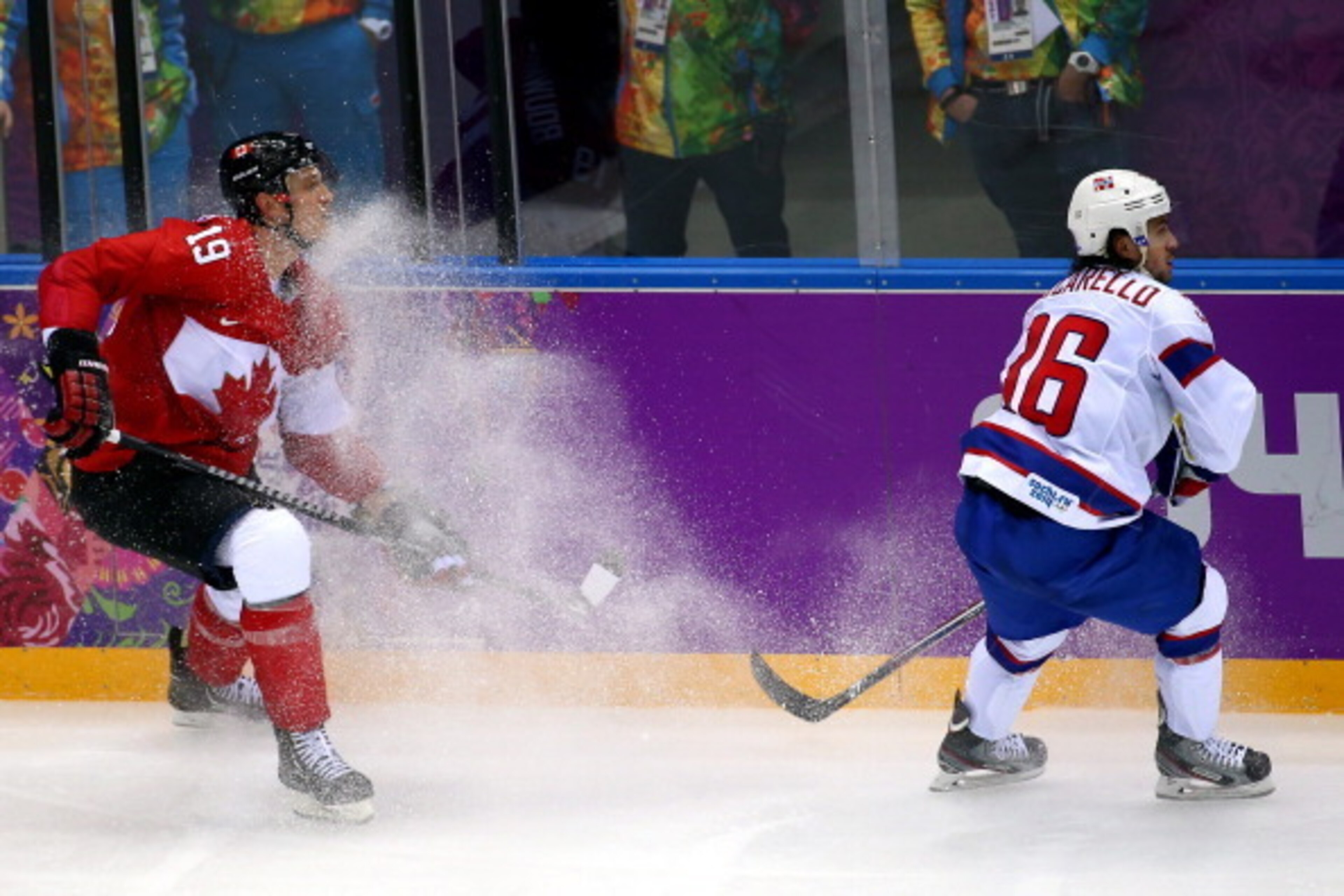 SOCHI, RUSSIA - FEBRUARY 13:  Mats Zuccarello Aasen #36 of Norway sprays Jay Bouwmeester #19 of Canada with ice during the Men's Ice Hockey Preliminary Round Group B game on day six of the Sochi 2014 Winter Olympics at Bolshoy Ice Dome on February 13, 201