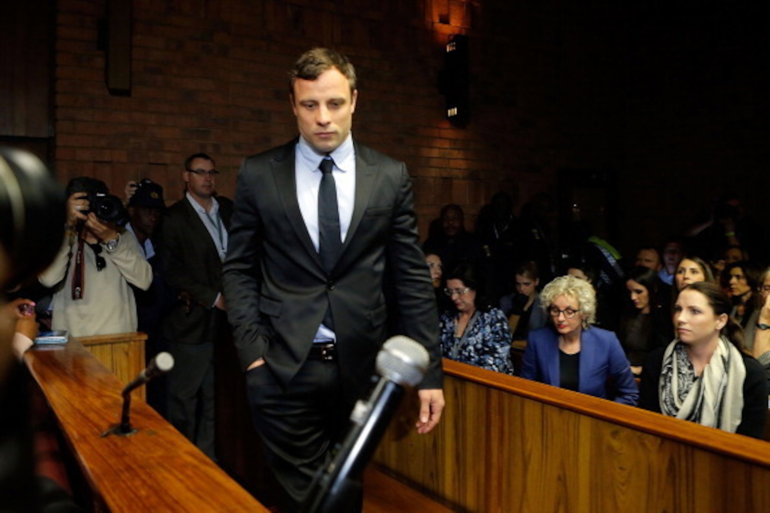 PRETORIA, SOUTH AFRICA - AUGUST 19:  South African athlete Oscar Pistorius appears in Pretoria Magistrates Court for an indictment hearing on August 19, 2013 in Pretoria, South Africa. Pistorius, 26 is accused of murdering his girlfriend Reeva Steenkamp w