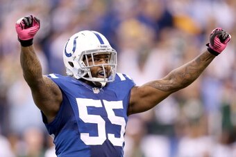 INDIANAPOLIS, IN - OCTOBER 07:  Justin Hickman #55 of the Indianapolis Colts celebrates after missed field goal that would of tied the game in the final seconds during the NFL game against the Green Bay Packers at Lucas Oil Stadium on October 7, 2012 in I