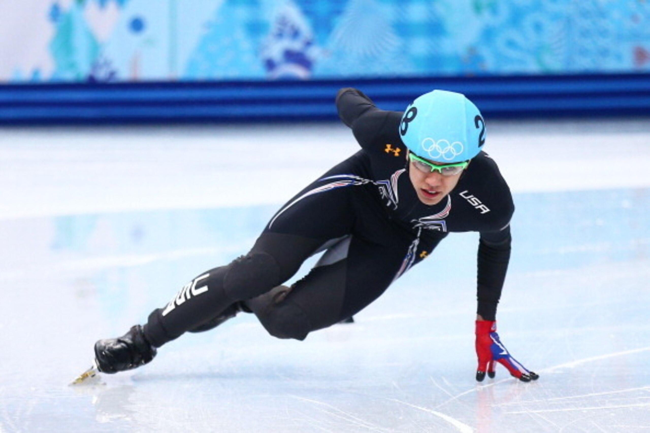 SOCHI, RUSSIA - FEBRUARY 13:  J.R. Celski of the United States competes in the Short Track Men's 1000 m Heat on day 6 of the Sochi 2014 Winter Olympics at at Iceberg Skating Palace on February 13, 2014 in Sochi, Russia.  (Photo by Clive Mason/Getty Images