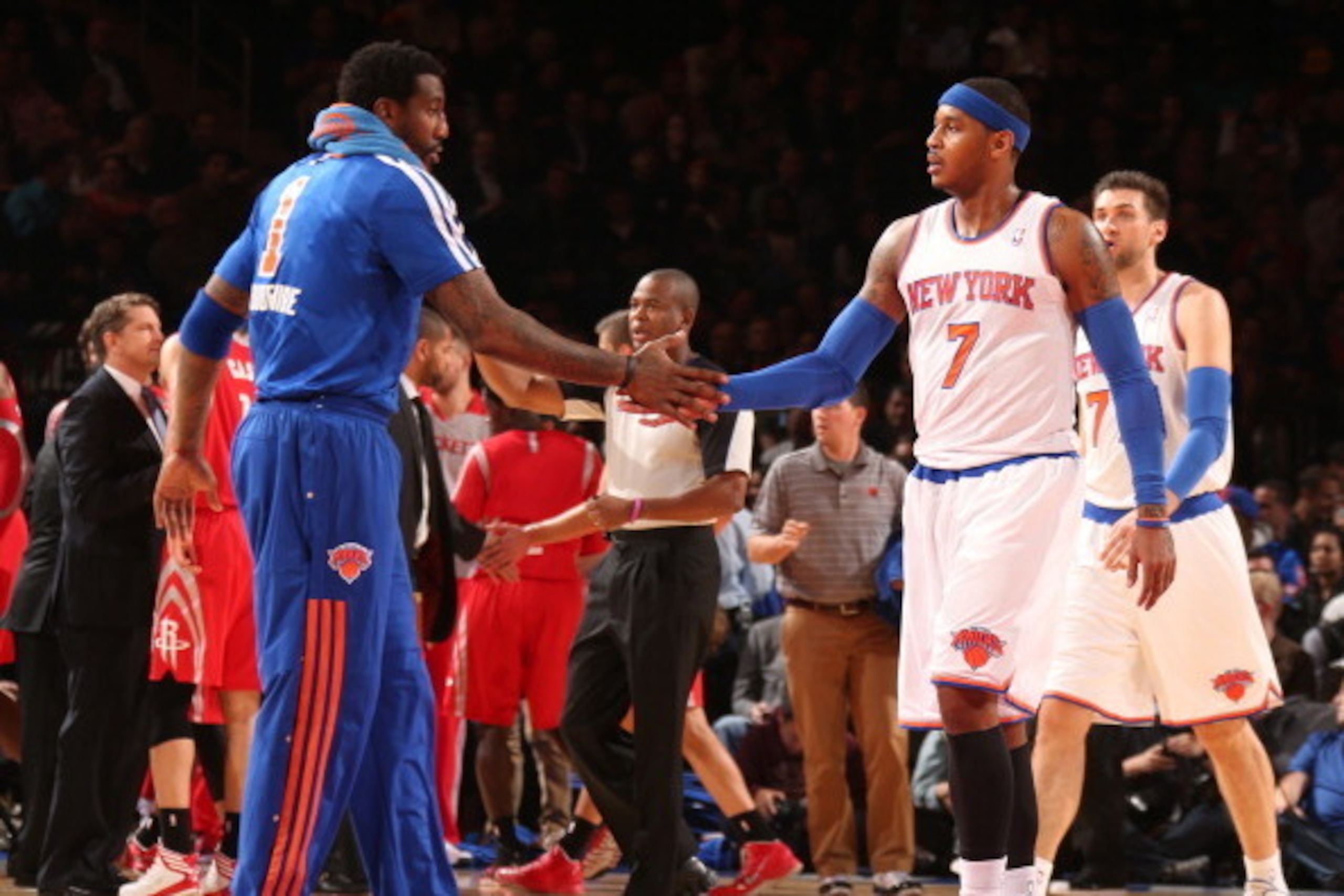 NEW YORK, NY - NOVEMBER 14: Teammates Amar'e Stoudemire #1 and Carmelo Anthony #7 of the New York Knicks high five during a game against the Houston Rockets at Madison Square Garden in New York City on November 14, 2013.  NOTE TO USER: User expressly ackn