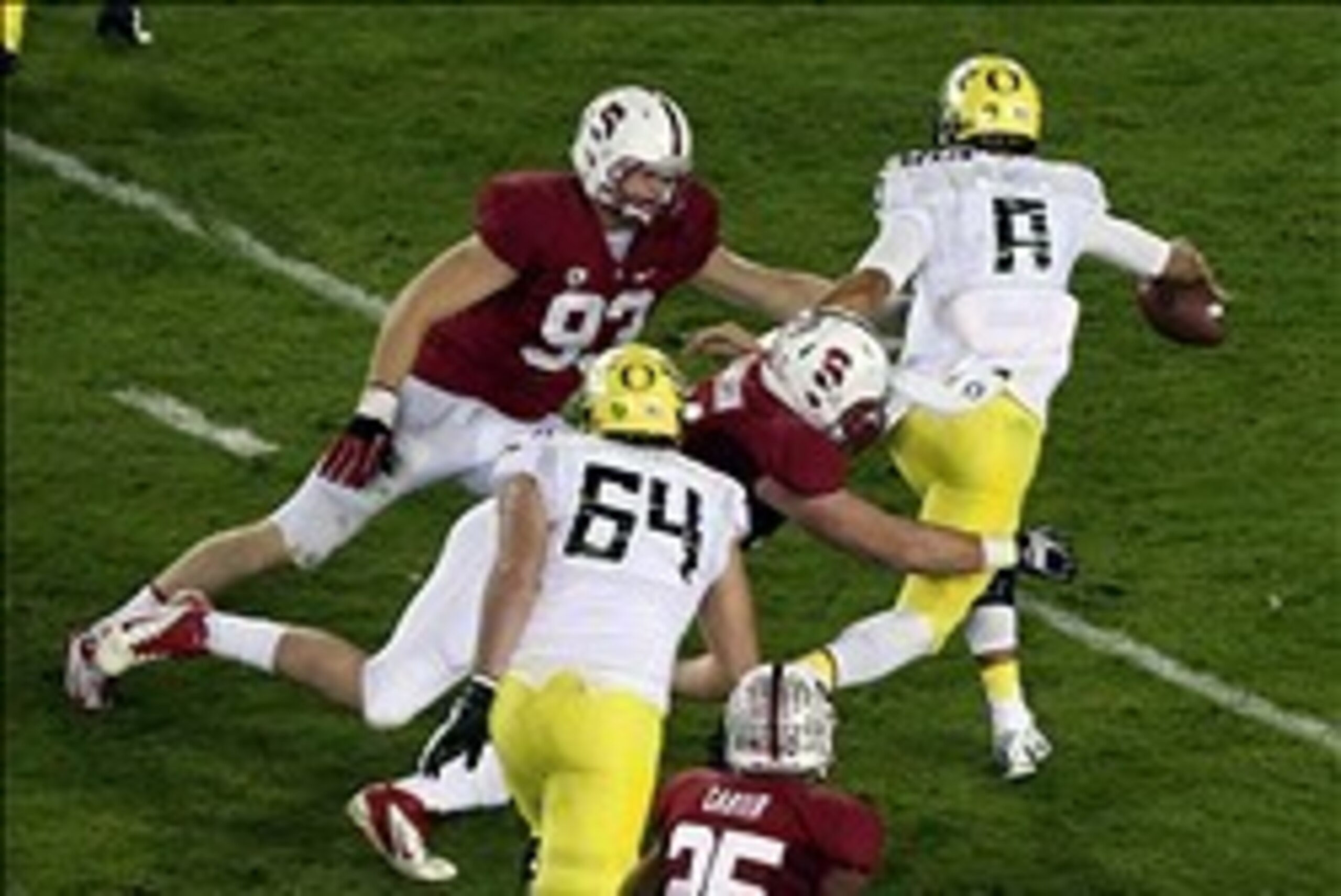 Nov 7, 2013; Stanford, CA, USA; Stanford Cardinal defensive end Henry Anderson (91) and linebacker Trent Murphy (93) sack Oregon Ducks quarterback Marcus Mariota (8) during the first quarter at Stanford Stadium. Mandatory Credit: Kelley L -USA TODAY Sport