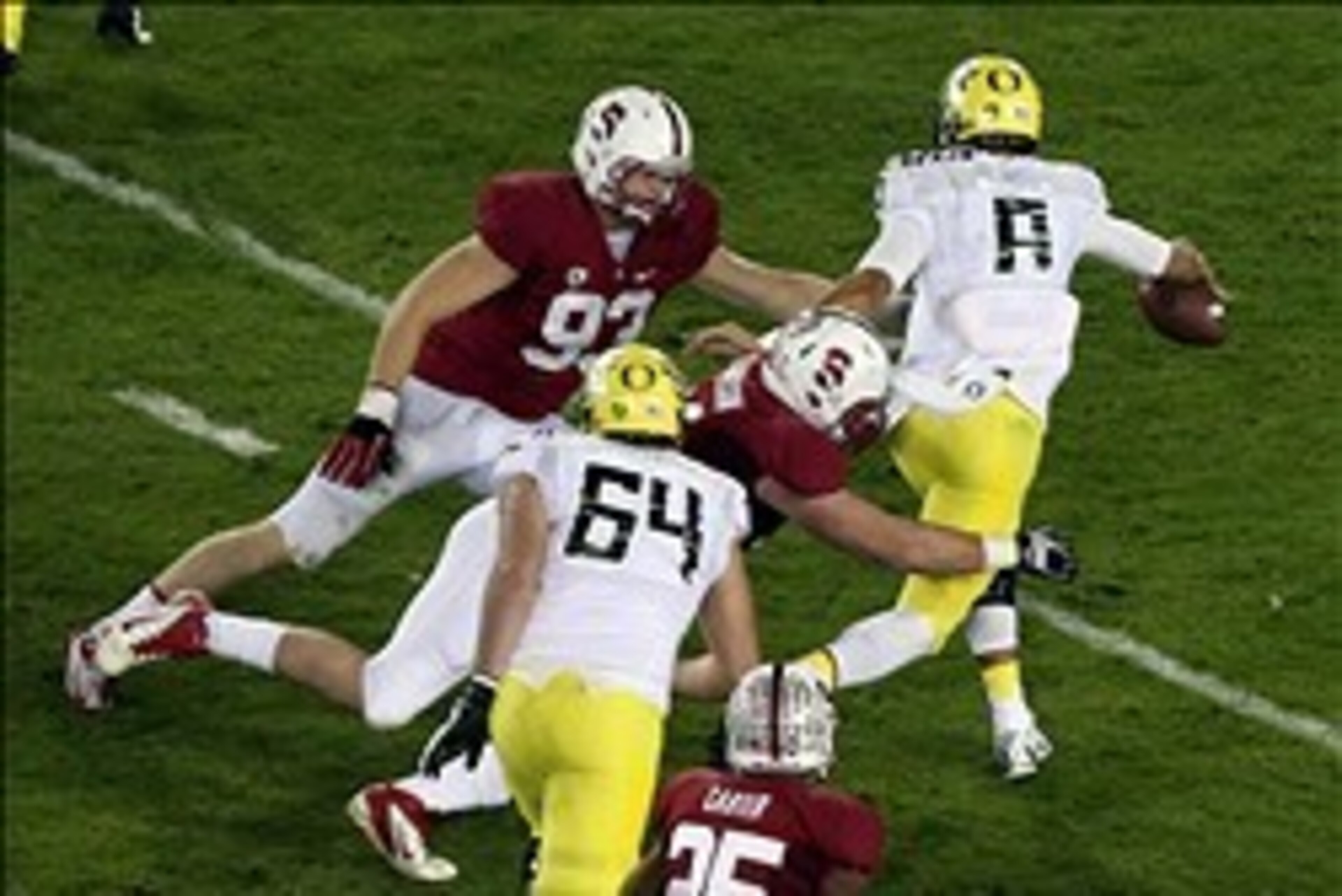 Nov 7, 2013; Stanford, CA, USA; Stanford Cardinal defensive end Henry Anderson (91) and linebacker Trent Murphy (93) sack Oregon Ducks quarterback Marcus Mariota (8) during the first quarter at Stanford Stadium. Mandatory Credit: Kelley L -USA TODAY Sport