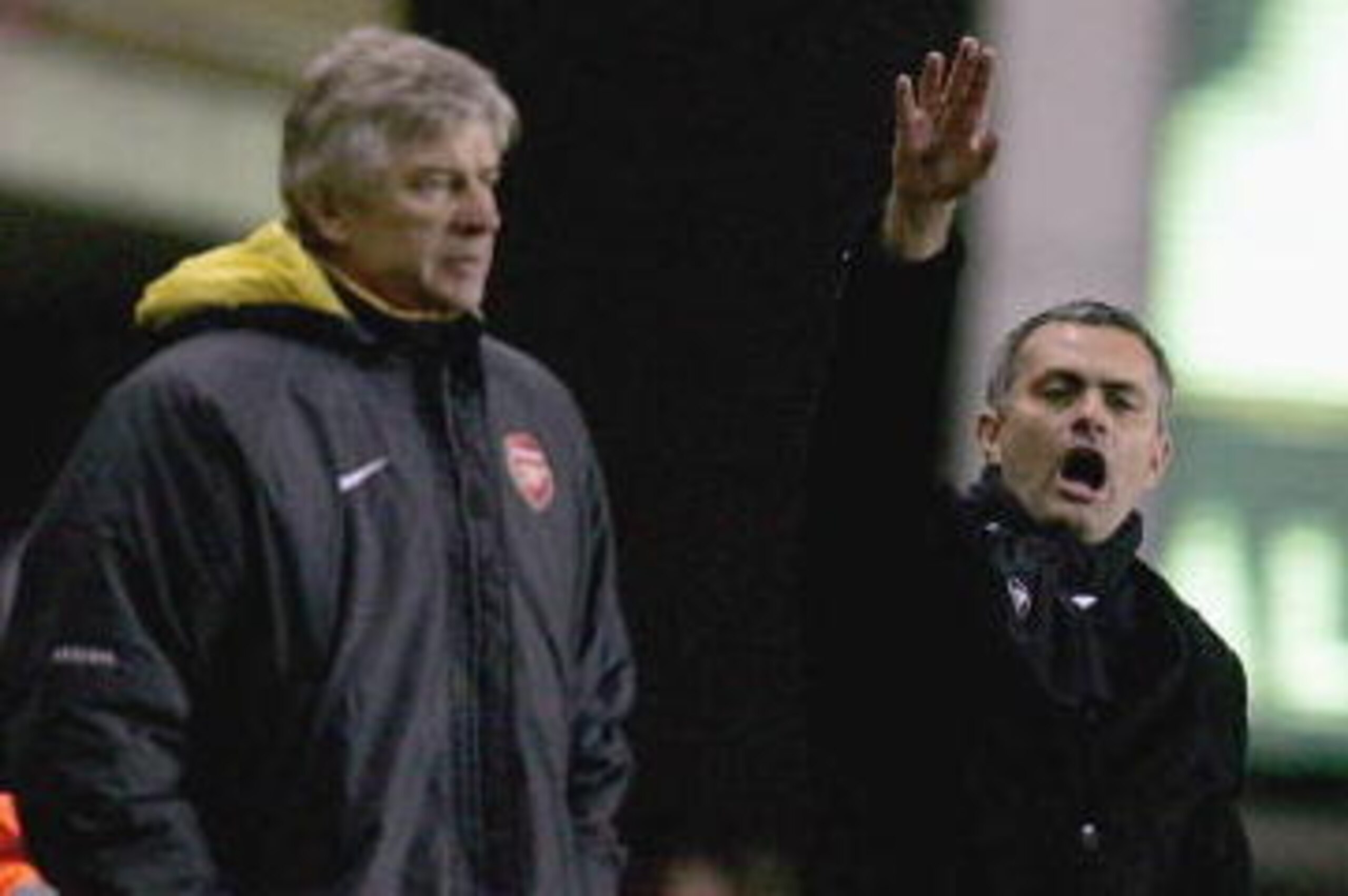 LONDON - DECEMBER 18:  Arsenal Manager Arsene Wenger (L) and Chelsea Manager Jose Mourinho (R) give instructions from the sidelines during the Barclays Premiership match between Arsenal and Chelsea at Highbury on December 18, 2005 in London, England.  (Ph