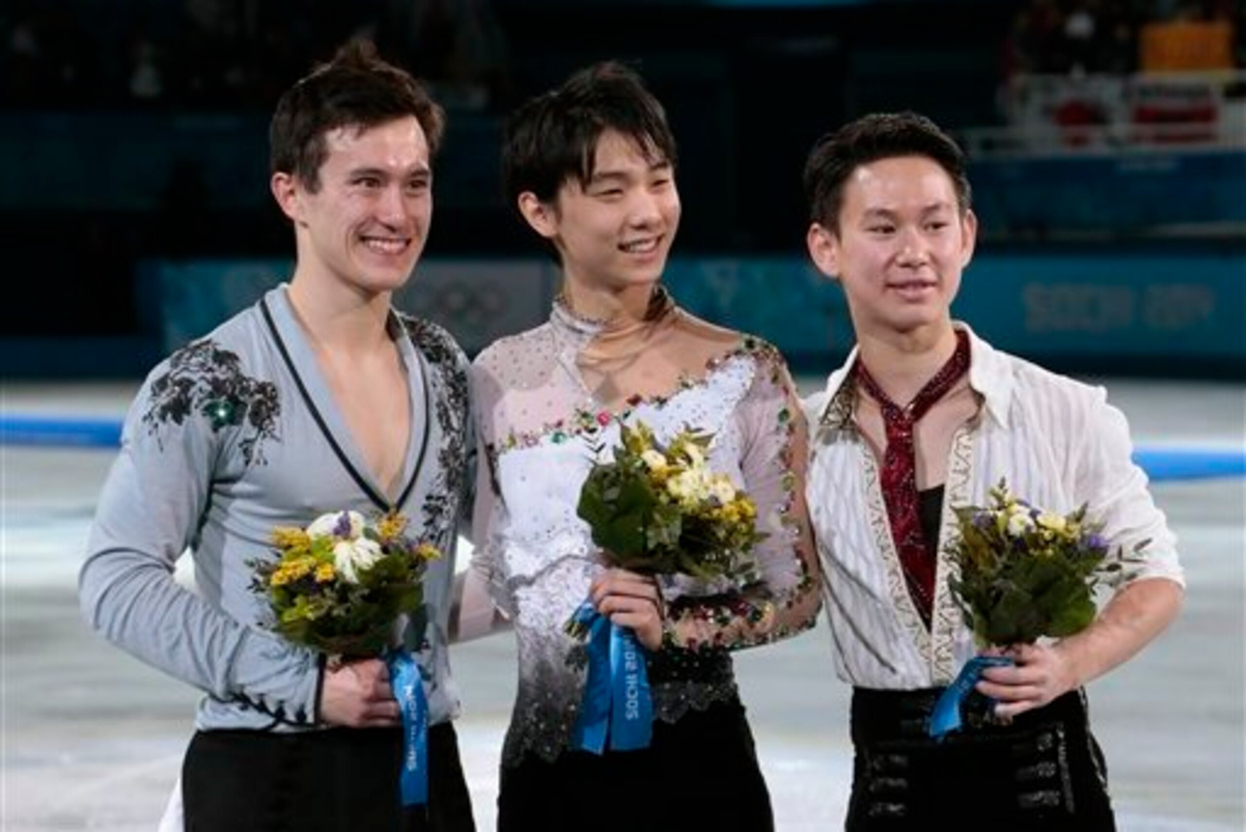 Chan (left), Hanyu and Denis Ten.