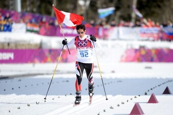 SOCHI, RUSSIA - FEBRUARY 14:  Roberto Carcelen of Peru competes in the Men's 15 km Classic during day seven of the Sochi 2014 Winter Olympics at Laura Cross-country Ski & Biathlon Center on February 14, 2014 in Sochi, Russia.  (Photo by Harry How/Getty Im