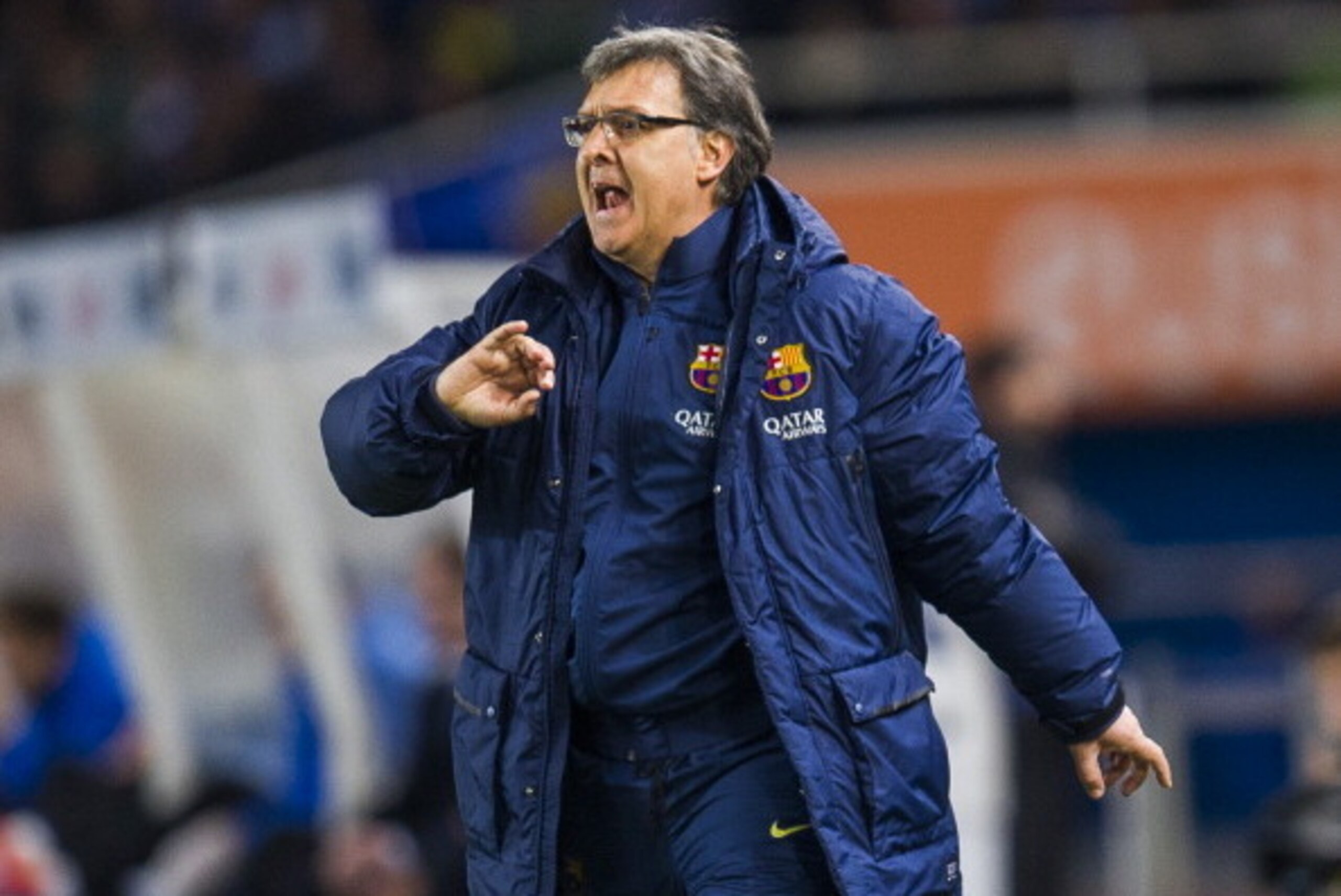 SAN SEBASTIAN, SPAIN - FEBRUARY 12:  Head coach Gerardo Tata Martino of FC Barcelona reacts during the Copa del Rey Semi-Final first leg match betweenReal Sociedad and Barcelona at Estadio Anoeta  on February 12, 2014 in San Sebastian, Spain.  (Photo by J